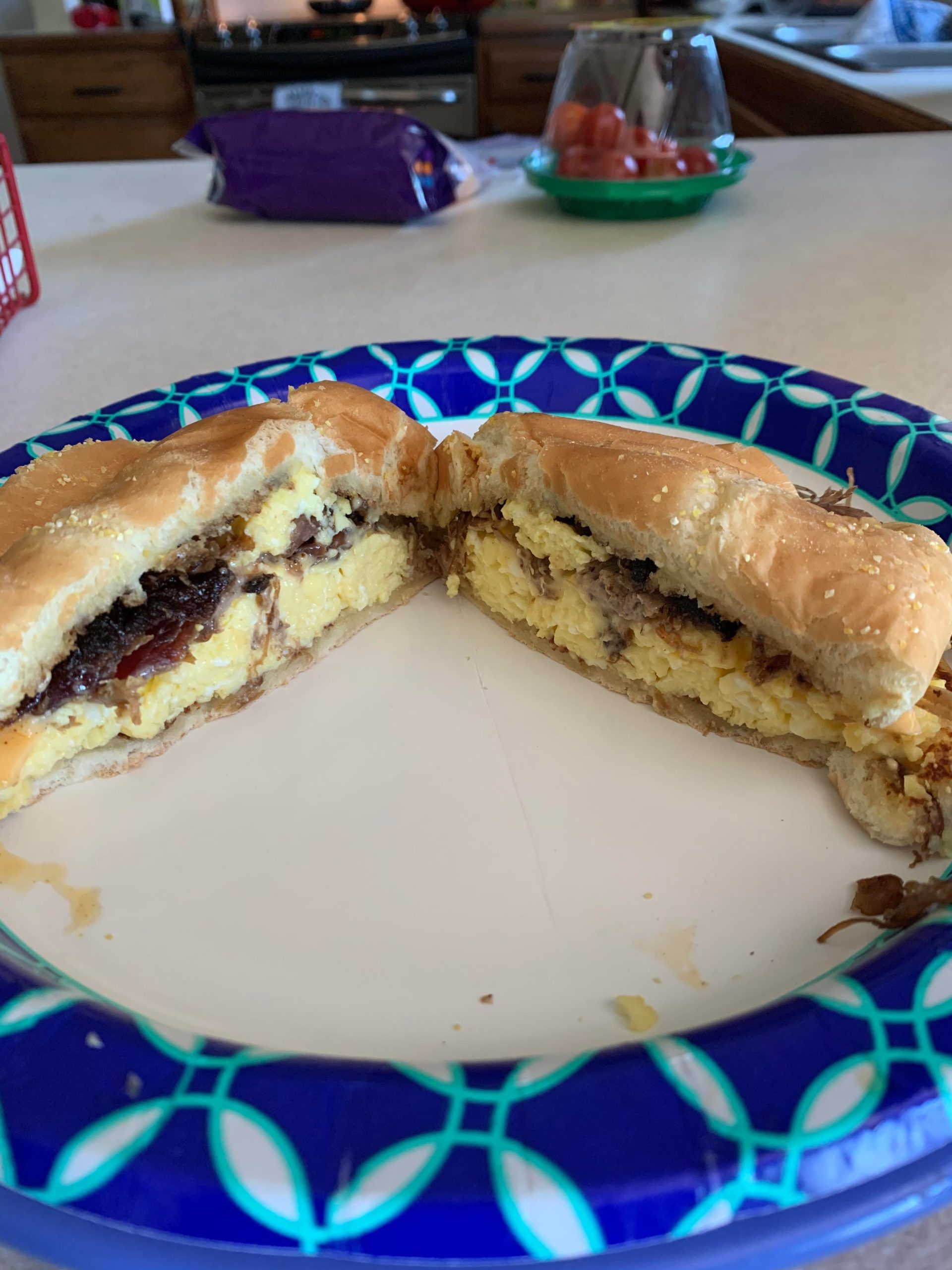 Pulled Pork, egg, and cheese sandwich on a butter toasted Kaiser roll