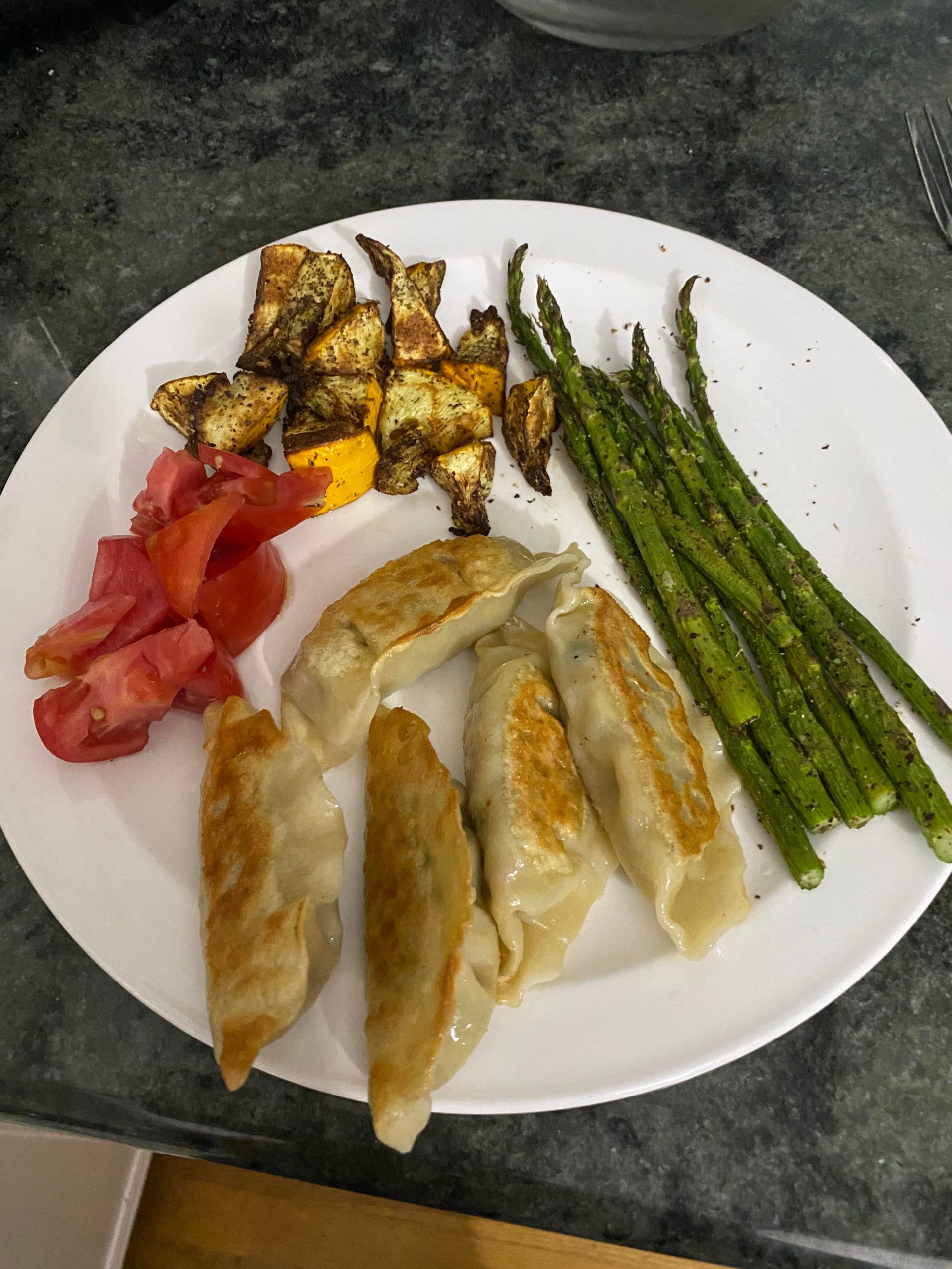 Pattypan Squash and Asparagus in the Air Fryer, fresh tomatoes and Veg Dumplings. Delicious