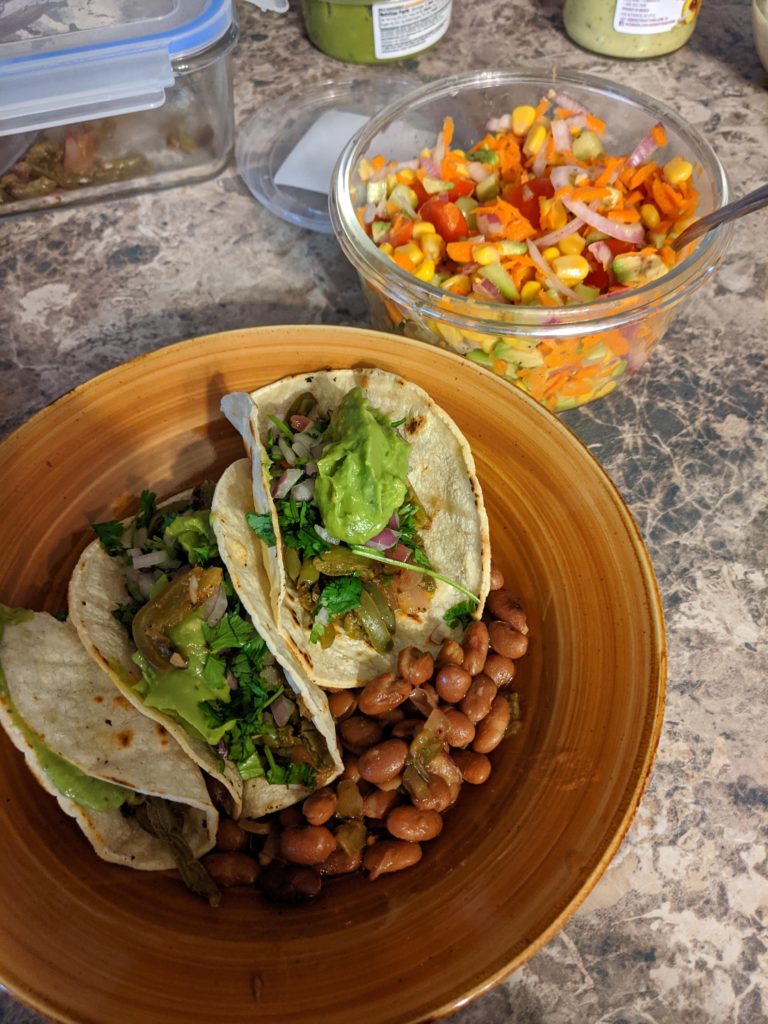Home made nopalitos tacos with pinto beans and a yummy salad c: