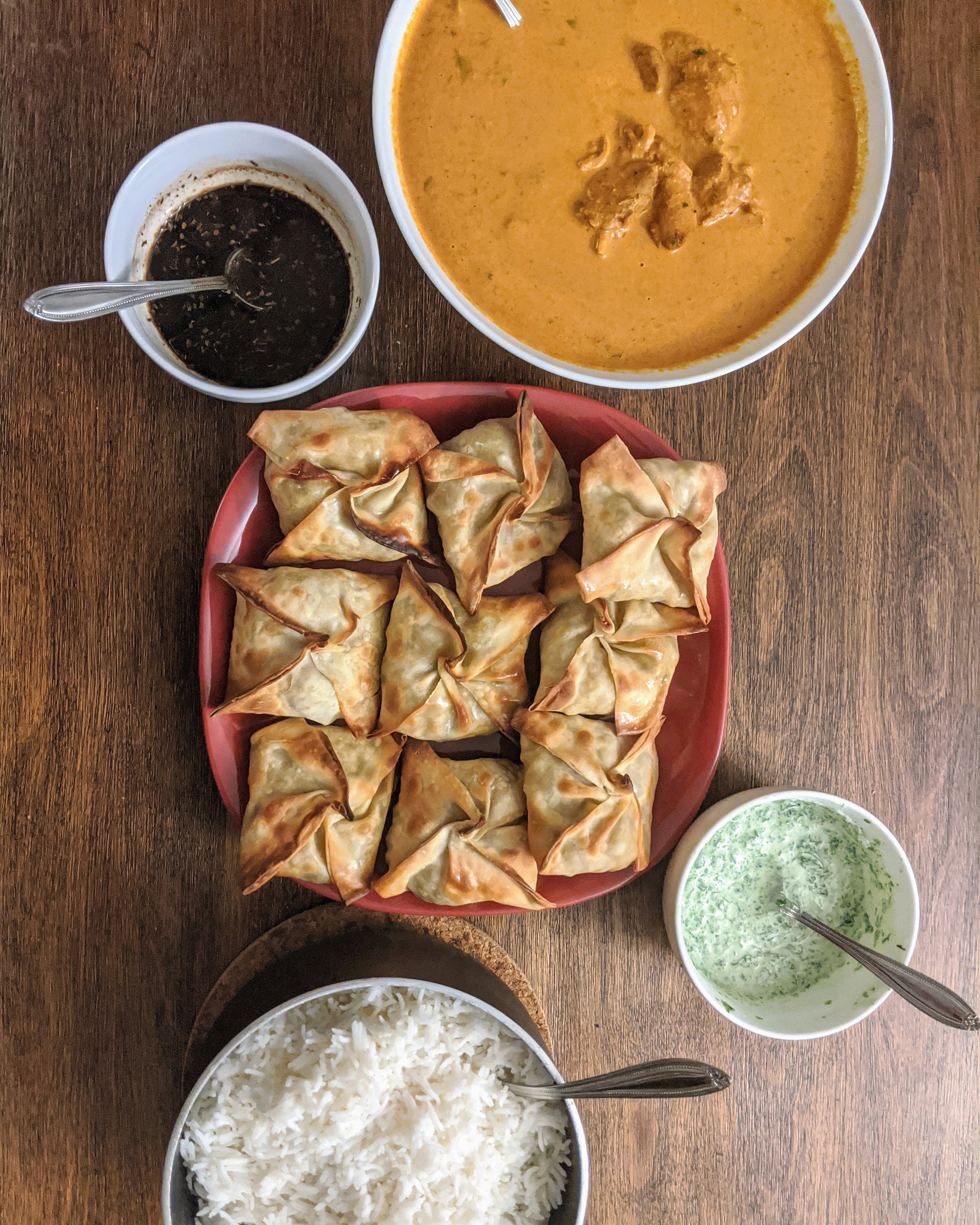 Homemade Butter Chicken Samosas With Cilantro Yogurt Chutney Tamarind Chutney And Basmati Rice Dining And Cooking Homemade Butter Chicken Samosas With Cilantro Yogurt Chutney Tamarind Chutney And Basmati Rice Dining And Cooking