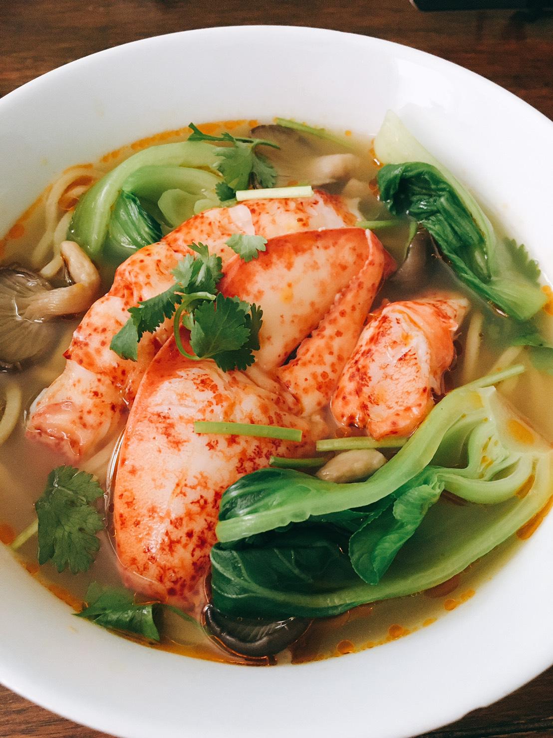 Lobster ramen with yuzu bisque soup, bok choy, oyster mushrooms and