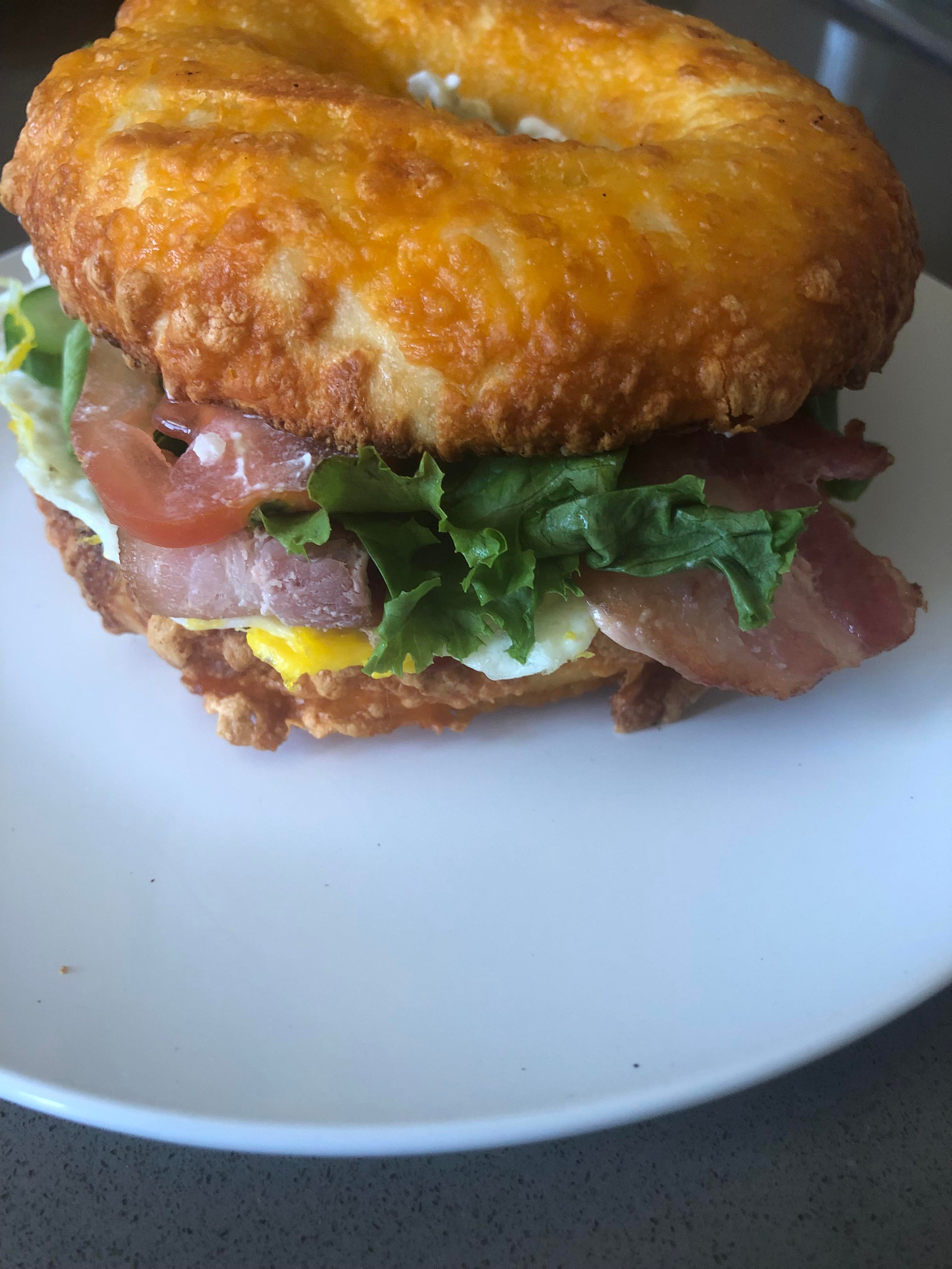 Cheese Bagel with Egg, Bacon, Tomato, Lettuce, Cucumber and Cream