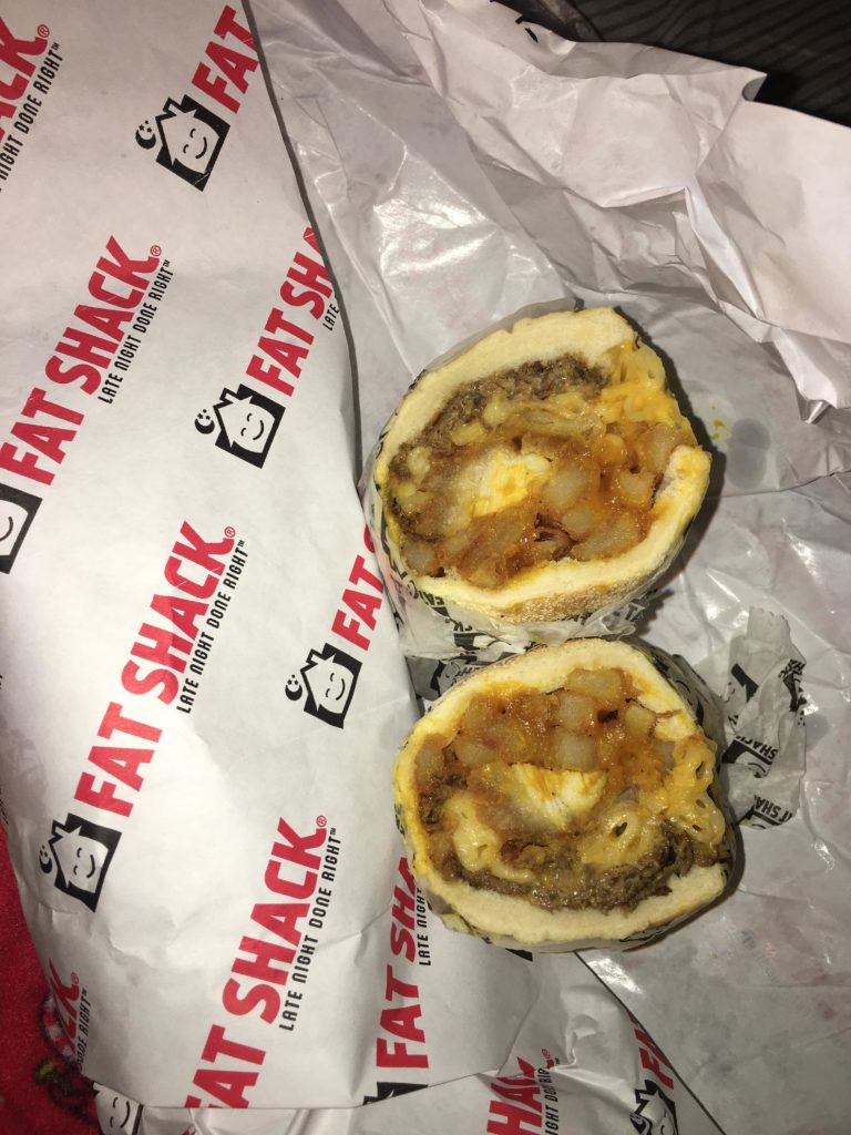 [i ate] and tried Fat Shack. My sandwich has Cheese steak, Mac N cheese, french fries, onion rings, and chicken tenders.... oh man, it's MORE amazing than I thought. 😭