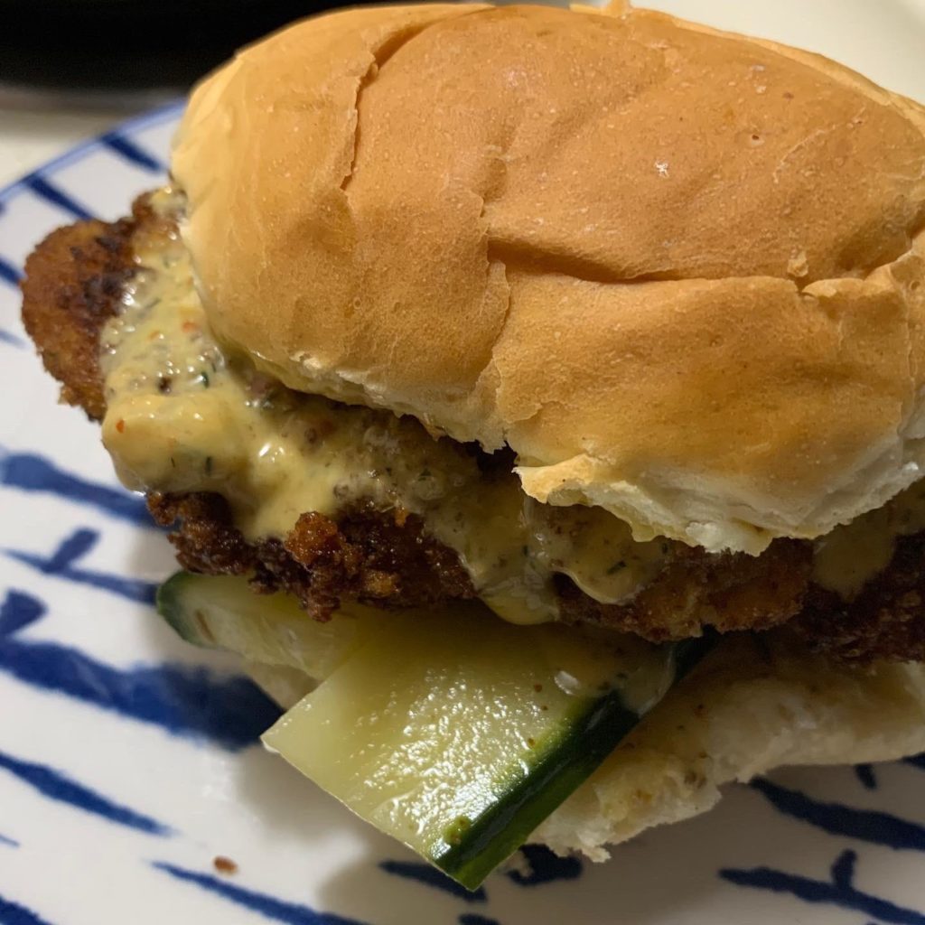 Fried Chicken Sandwich With Homemade Buffalo Sauce, Pickles, And Dinner Roll