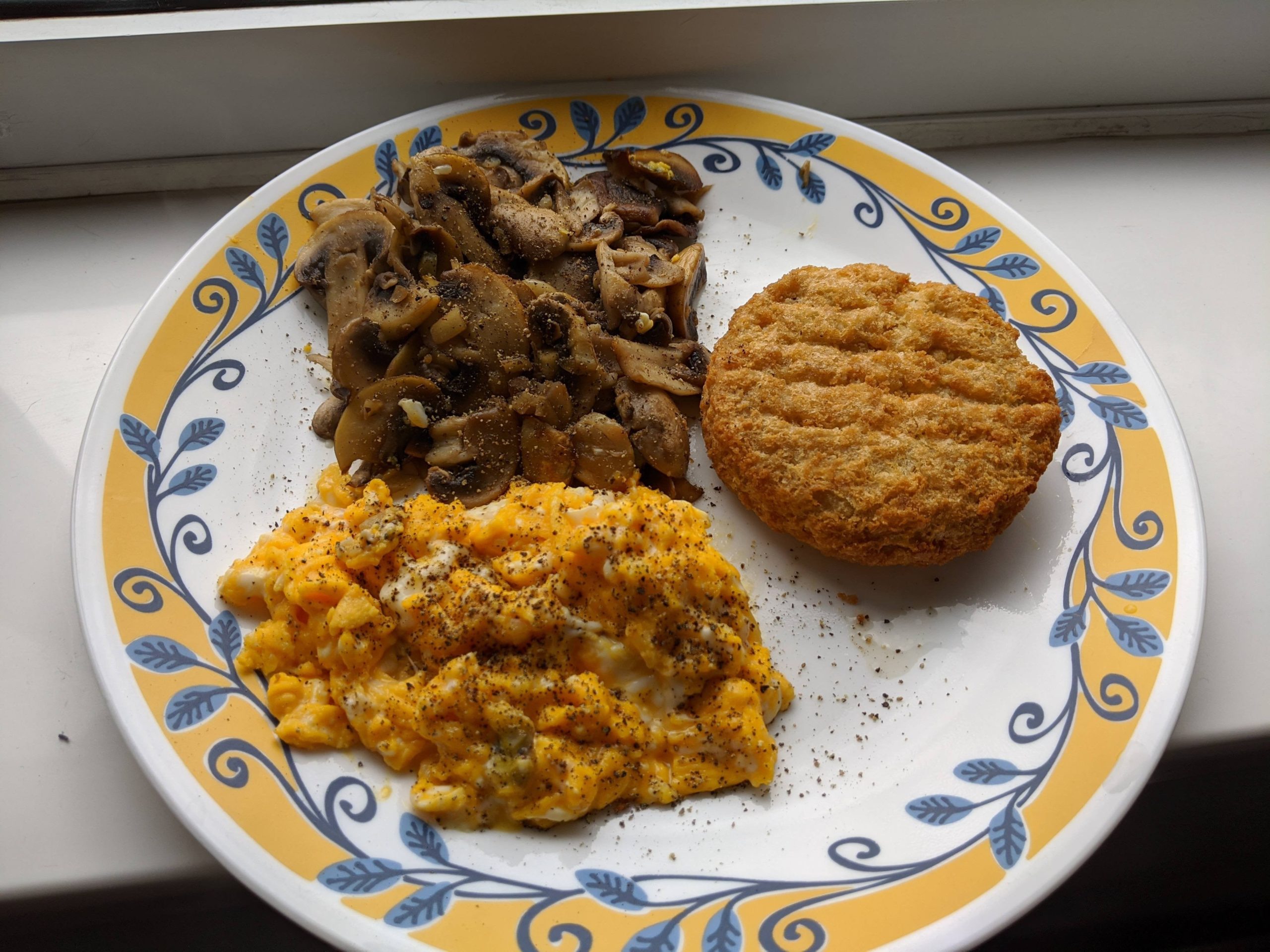 Garlic mushrooms, scrambled eggs, fish cake, 430 calories including oil