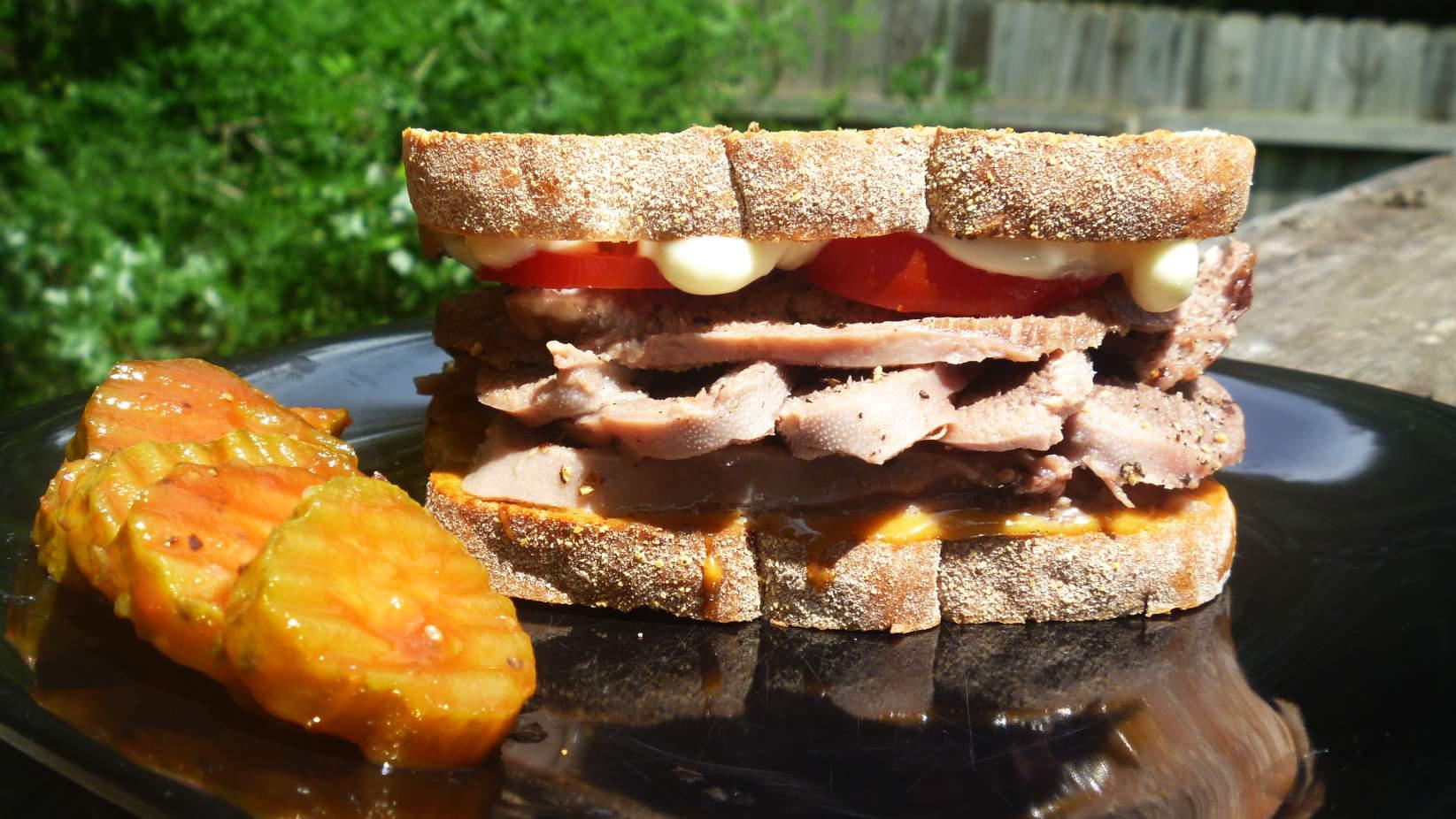 Spiced pickled Beef Tongue, horseradish mayo, honey mustard, on seeded