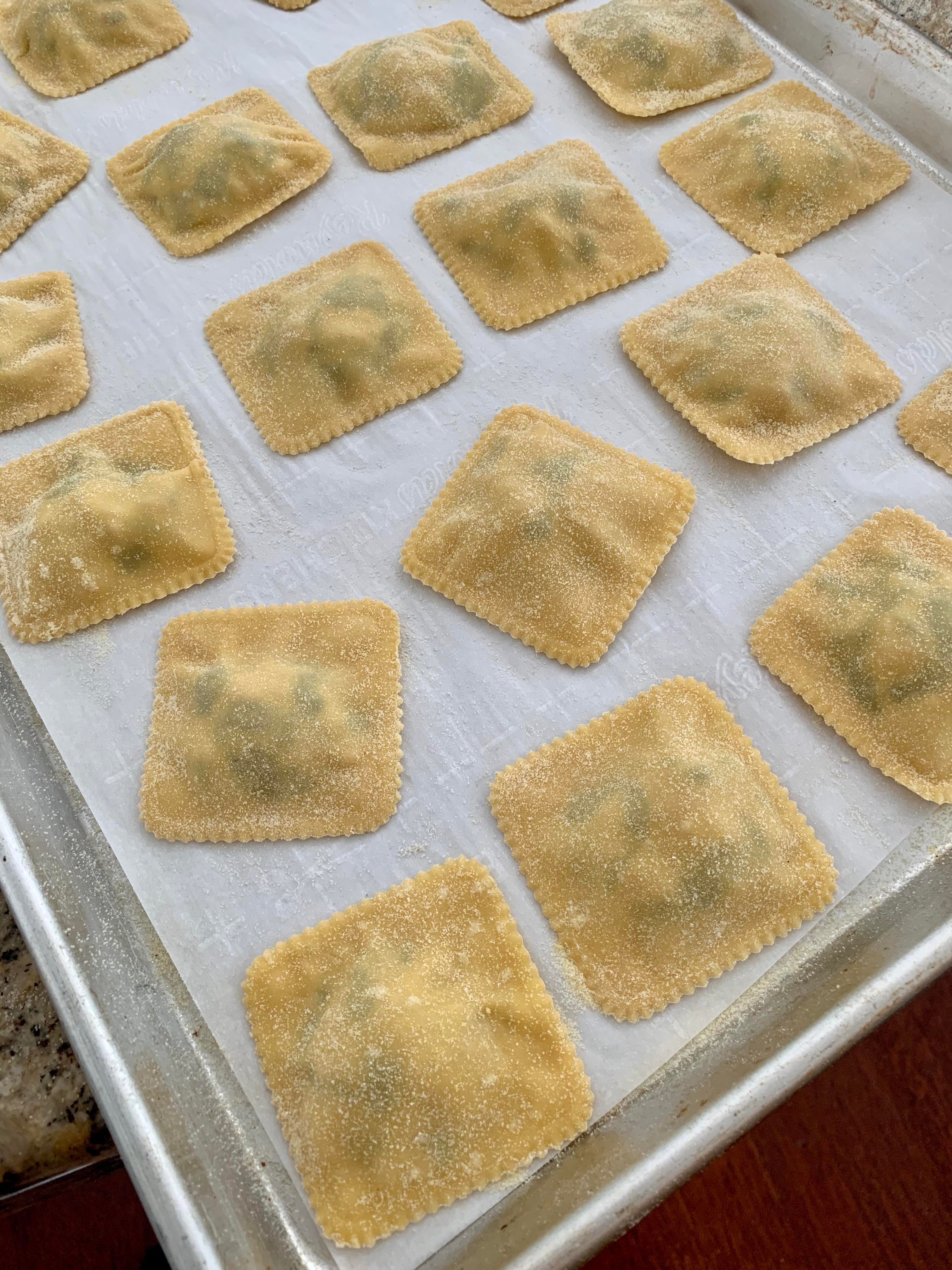 My first attempt at ravioli! Filled with an Italian sausage, spinach