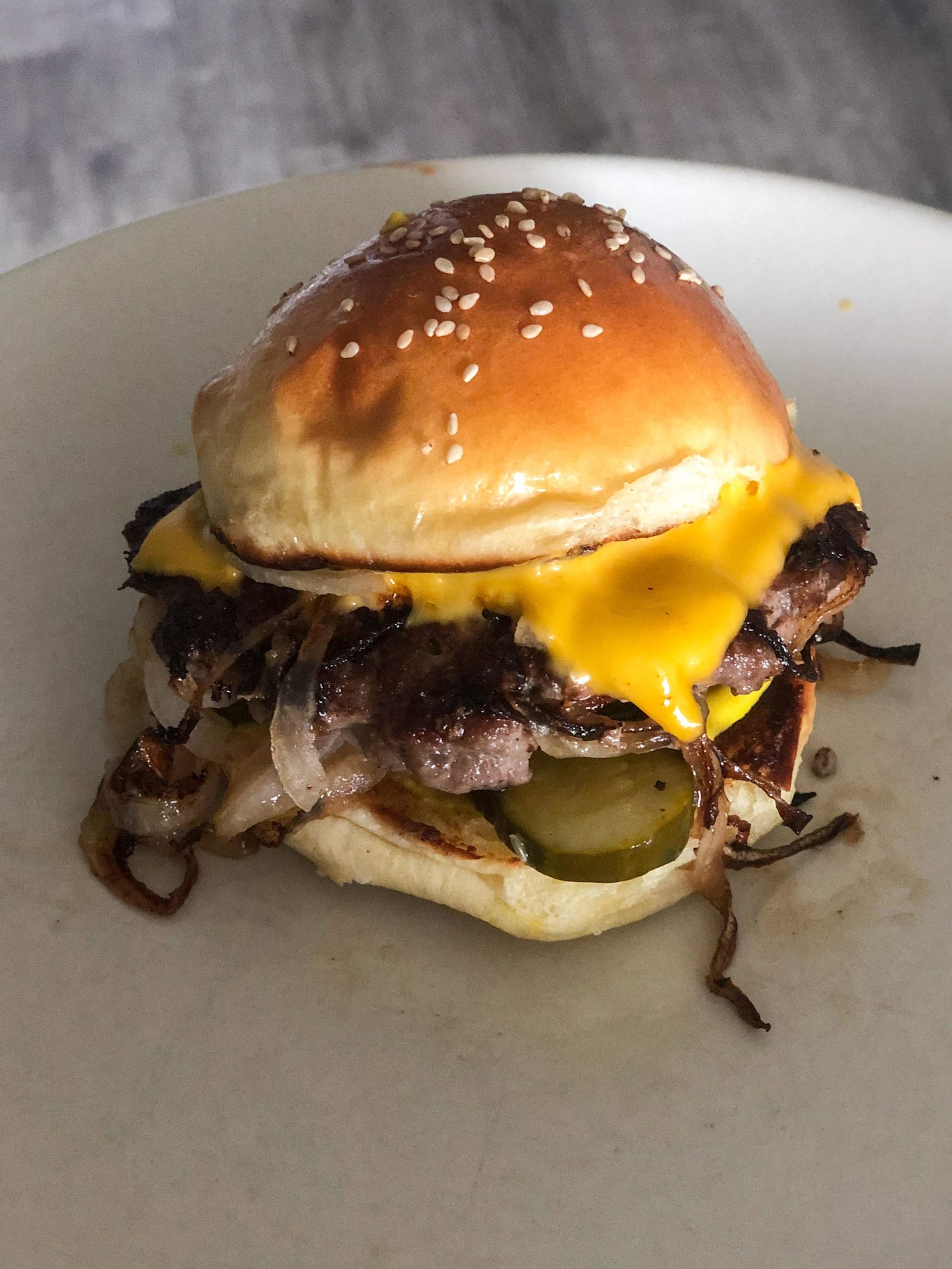 Oklahoma fried onion burger on a homemade bun and house ground beef