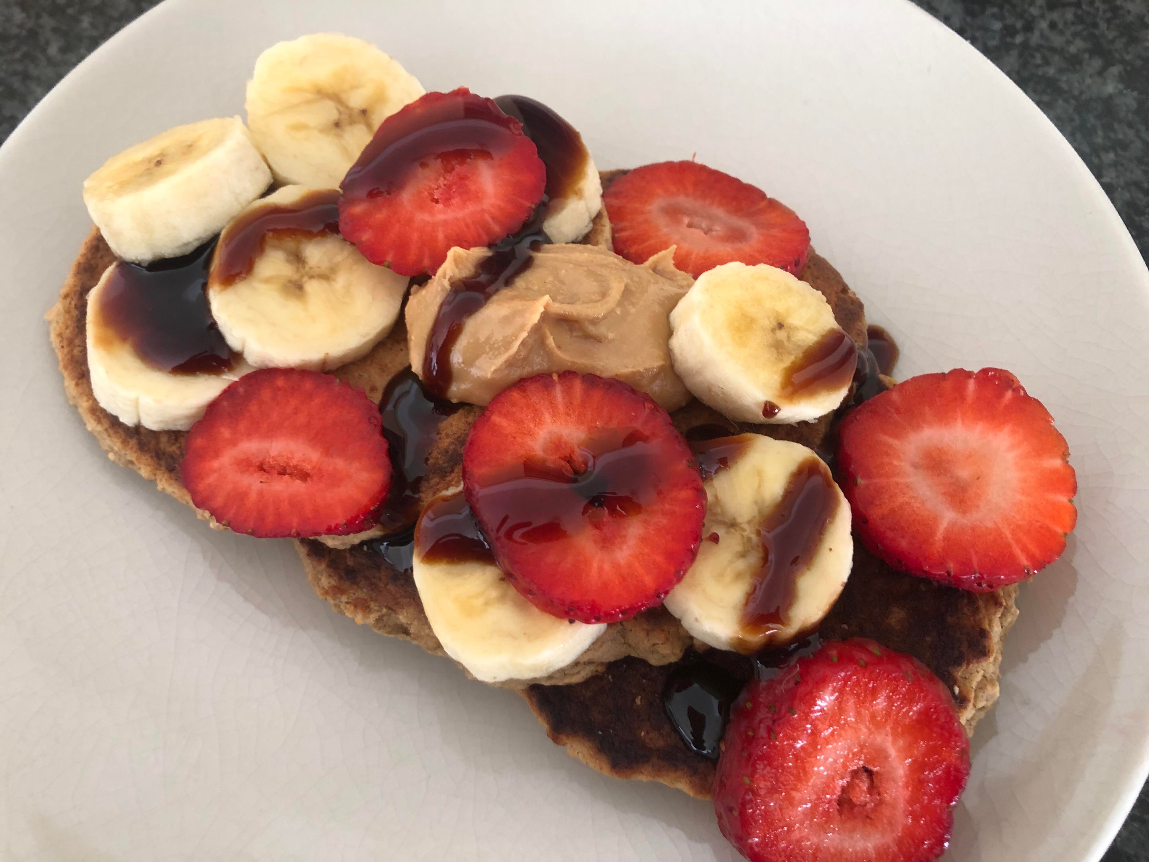 Wfpb peanut butter pancakes with fruit and date syrup a delicious healthy alternative to