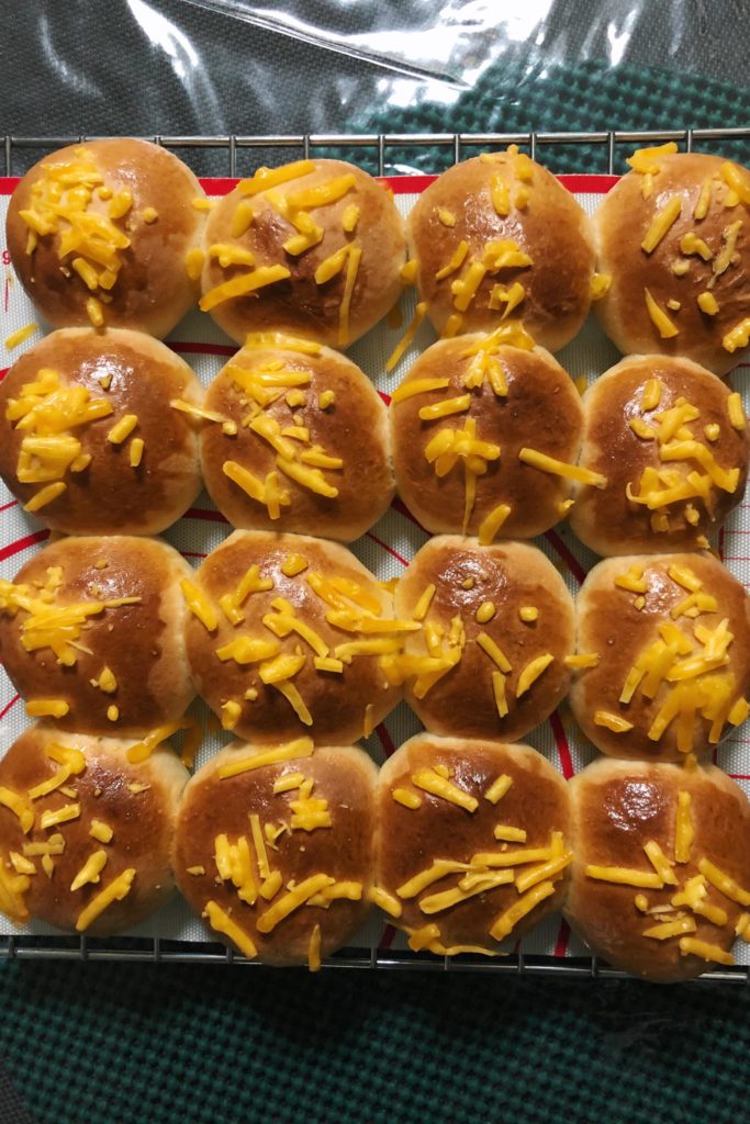 Made dinner rolls with cheddar cheese topping (and filling) because bread is lyf!