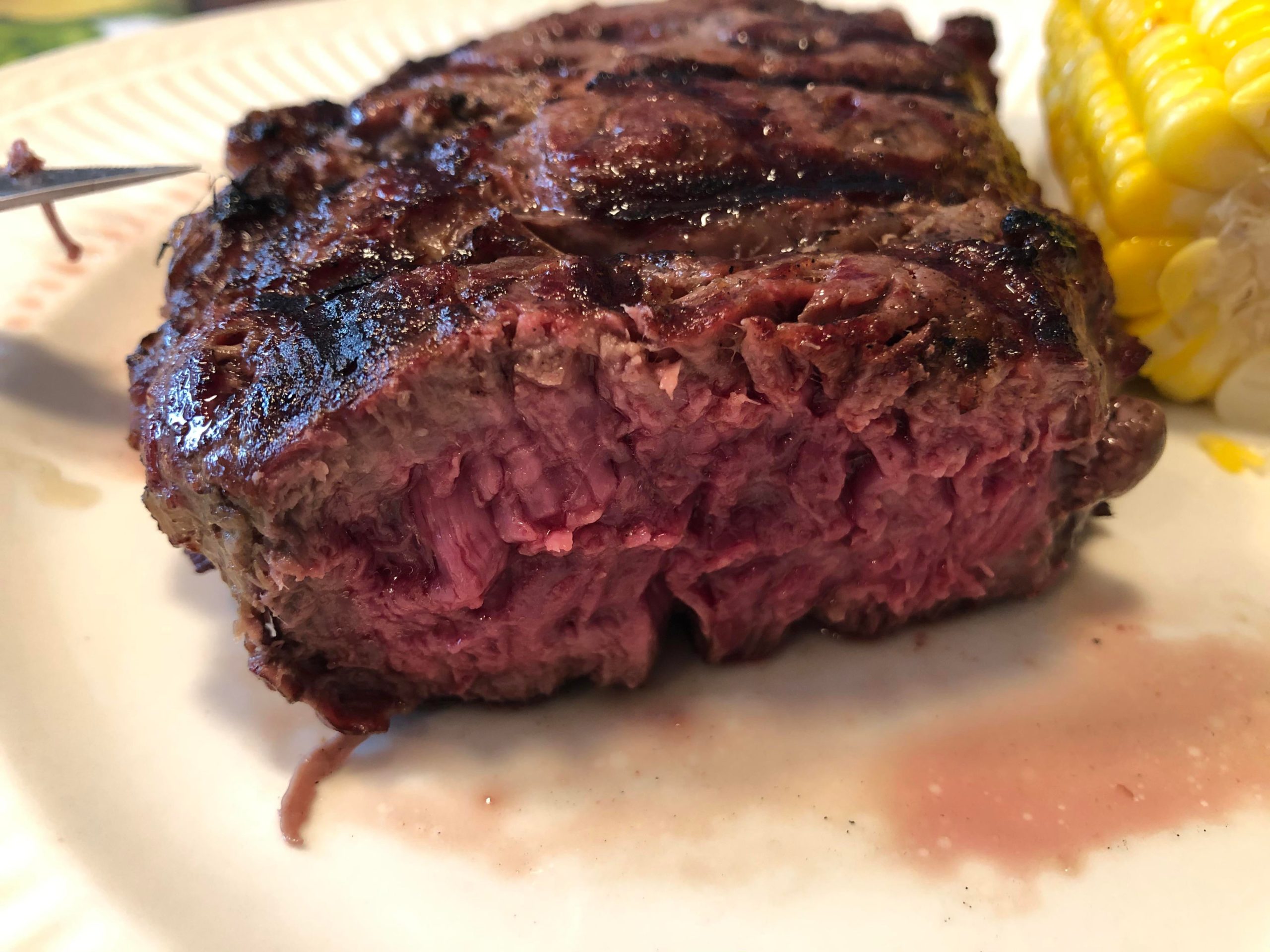 Ribeye on the weber grill with corn on the cob Dining and Cooking