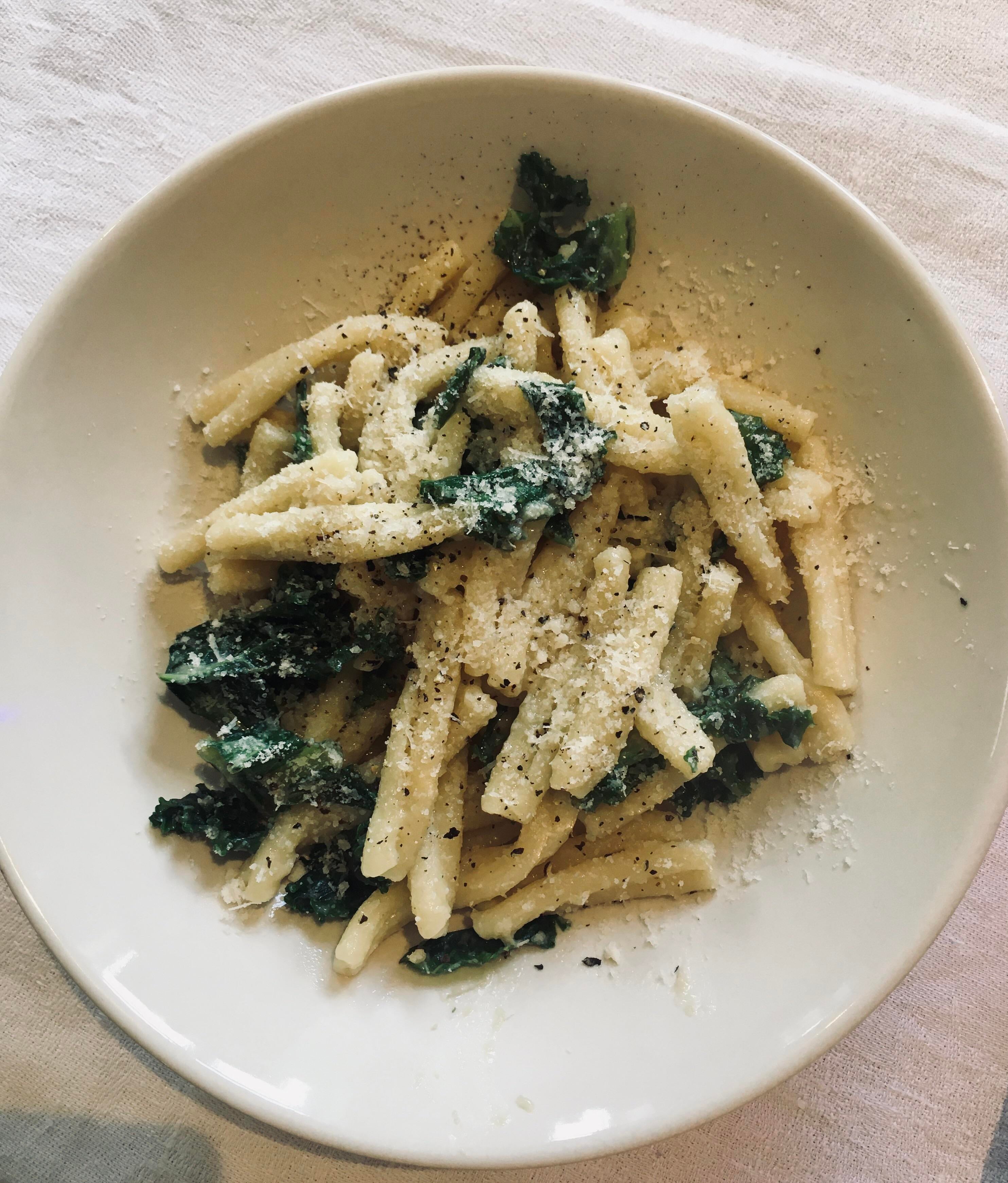 Truffle and artichoke pesto pasta with a sprinkling of kale and