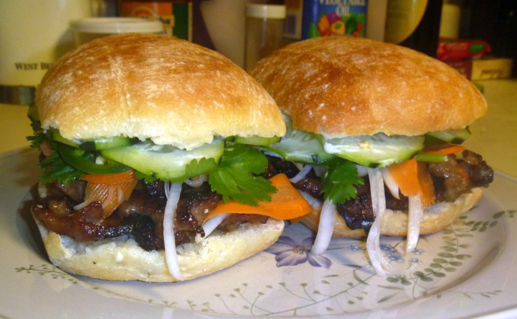 Costco's torta Rolls make a very acceptable banh mi. Meat is grilled thit nuong.