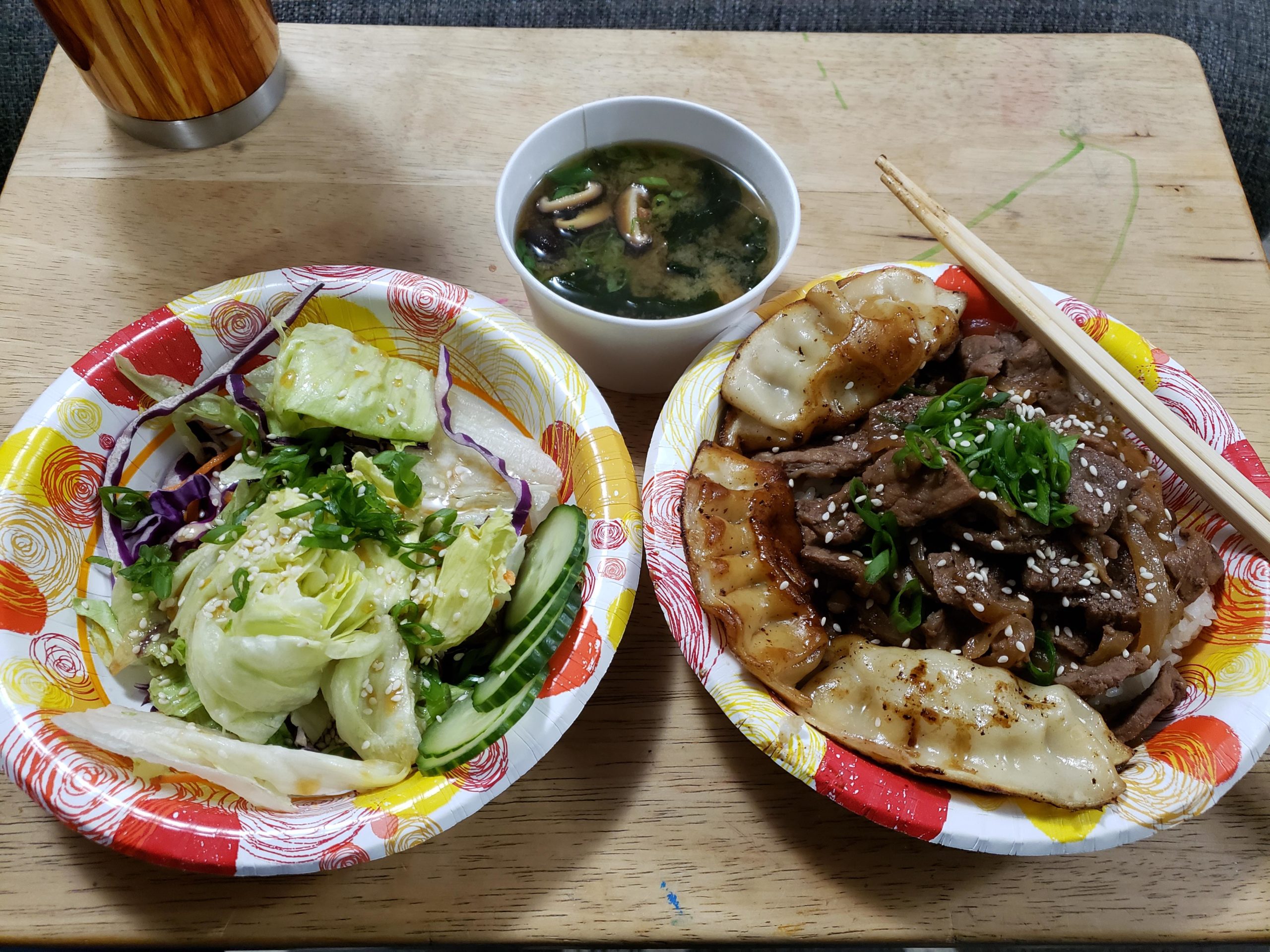 Miso with wakame and shiitake, salad with wafu dressing, gyoza, and