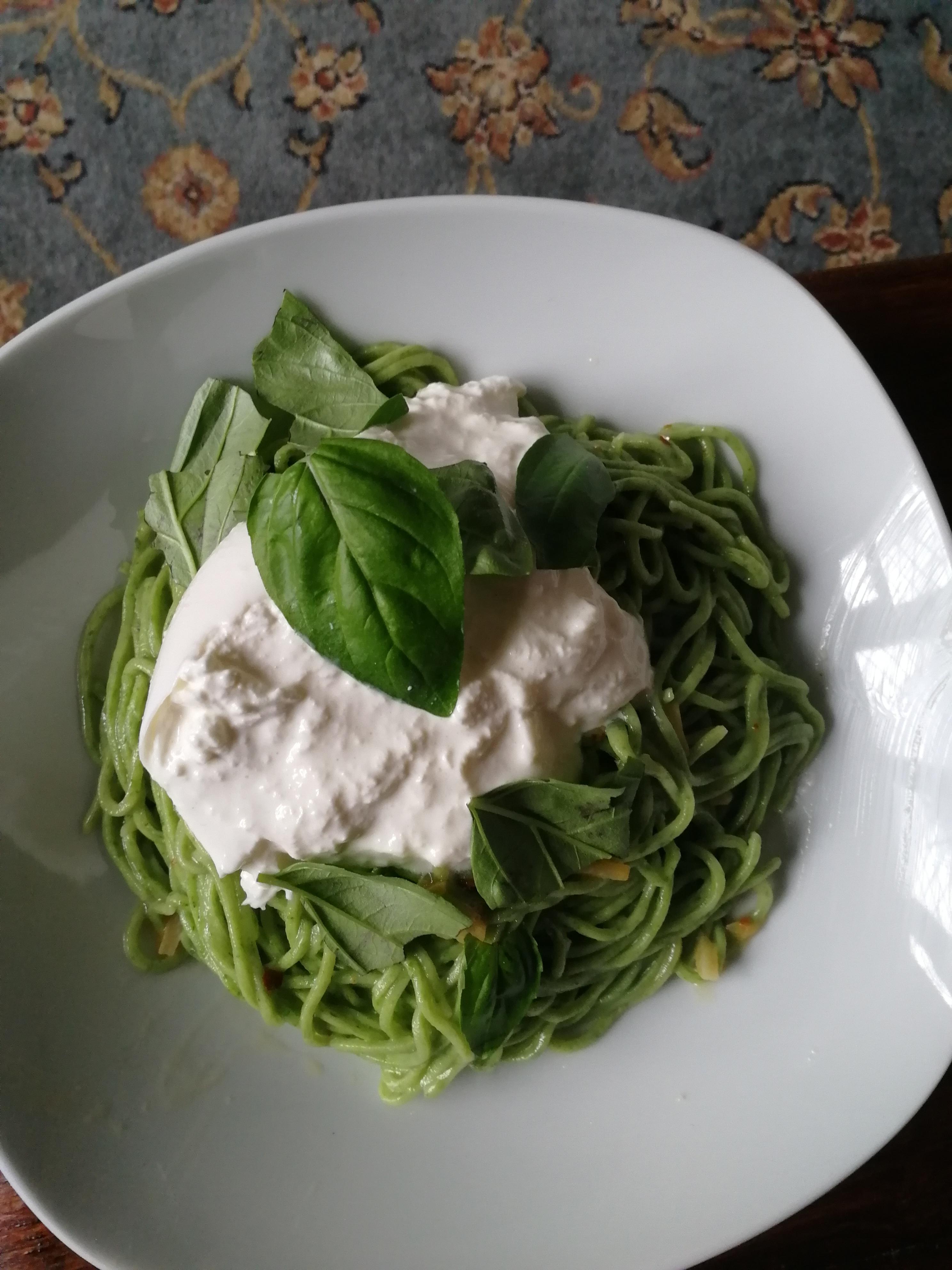 Spinach dough aglio e olio topped with a whole load of burrata the best pasta I've made yet