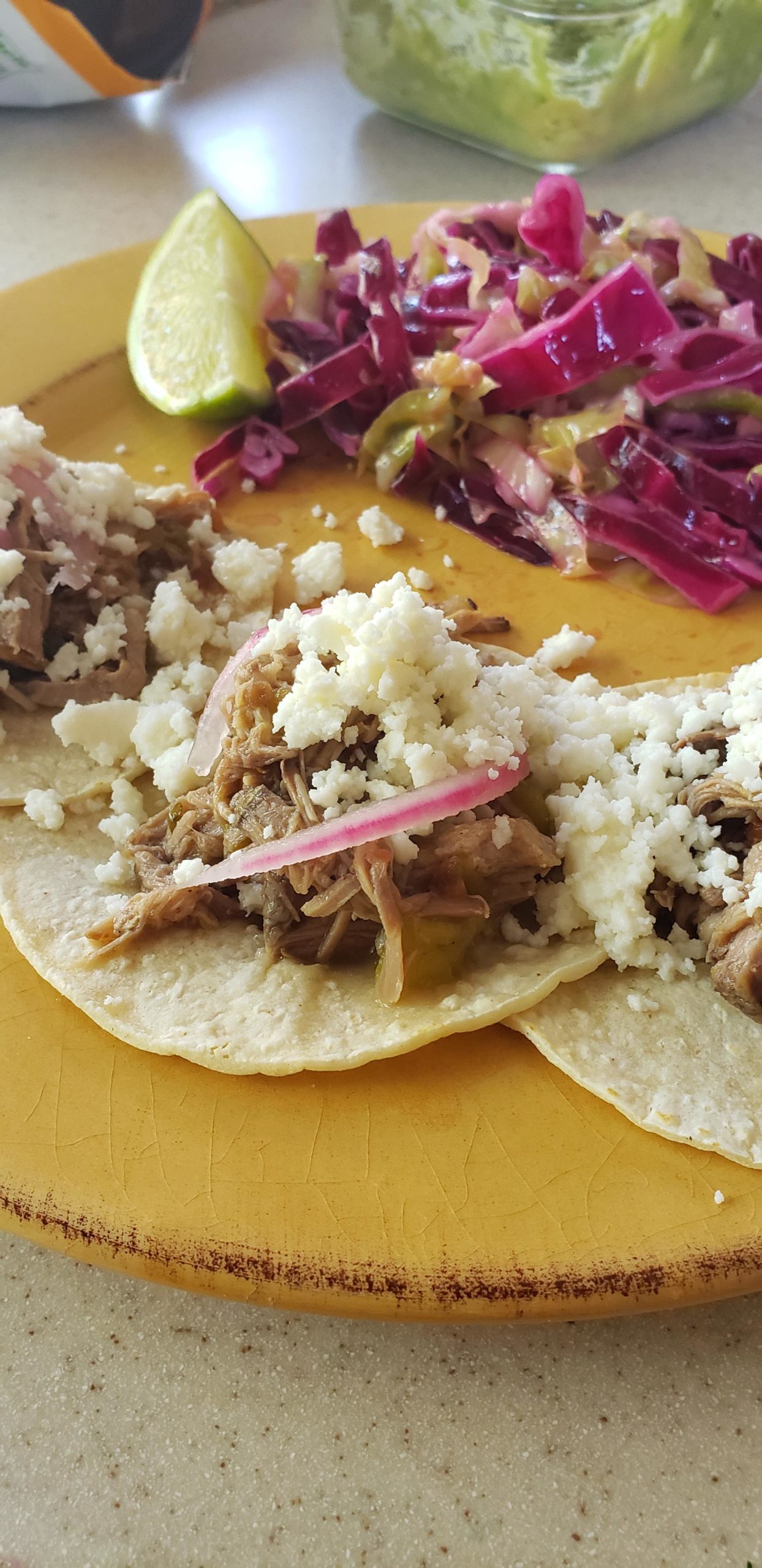 Slow Roasted Carnitas with Pickled Onion and Queso Fresco on White Corn