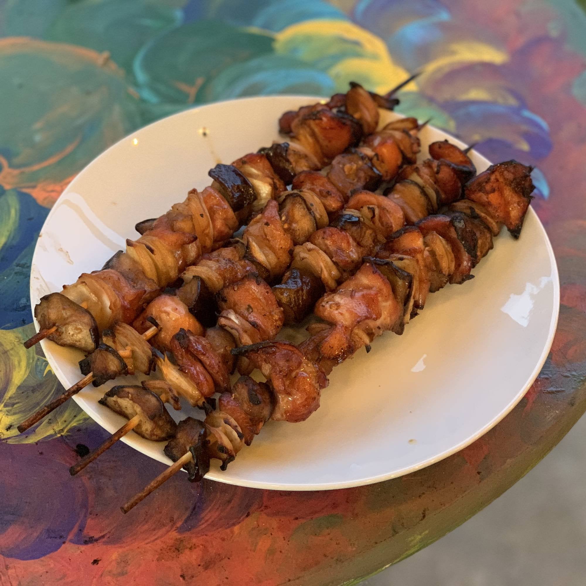 Chicken thigh, eggplant and onion kabobs marinated in soy sauce, honey