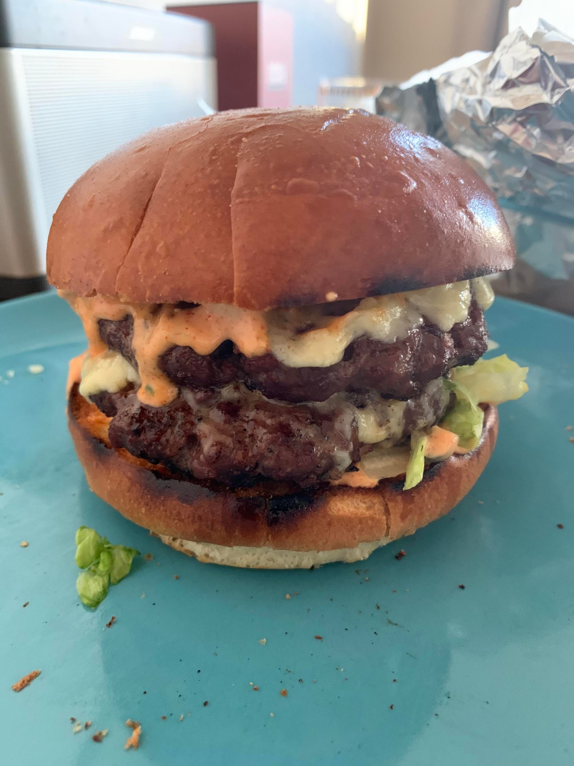 Grilled double cheese burger with homemade Big Mac sauce, shredded
