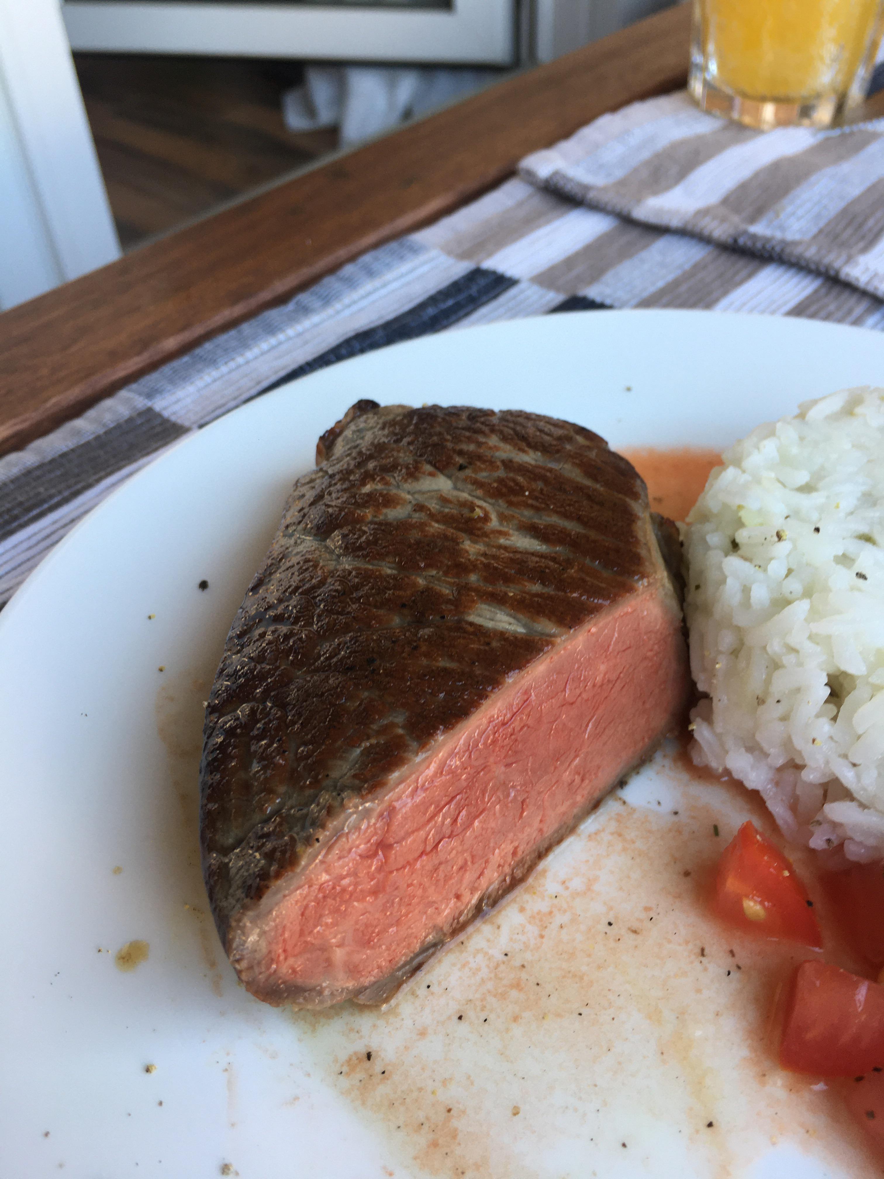 Perfect edge to edge ribeye barely medium rare. Seared in a screaming