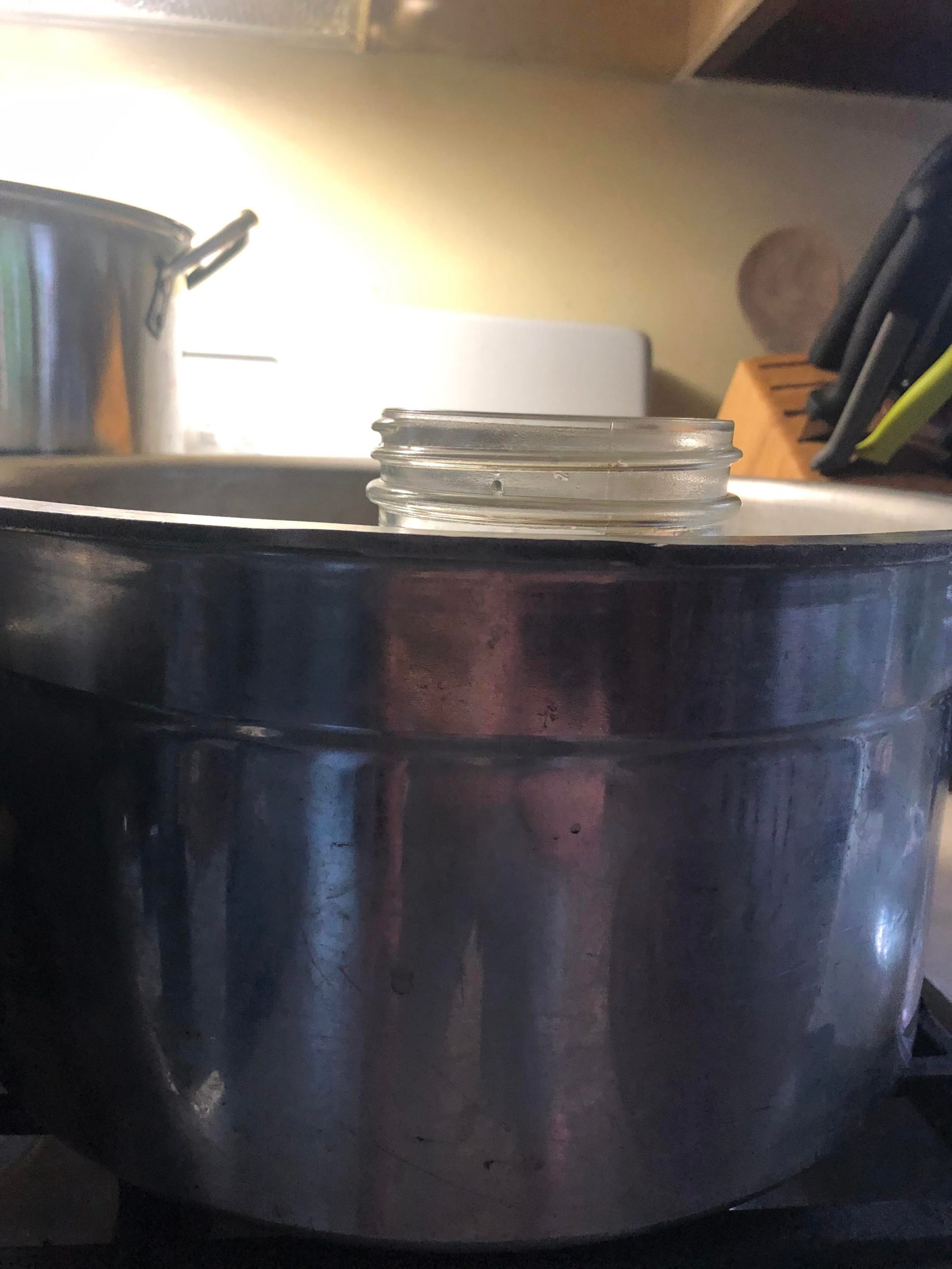 Does it matter that my jars are taller than my pressure canner? The lid
