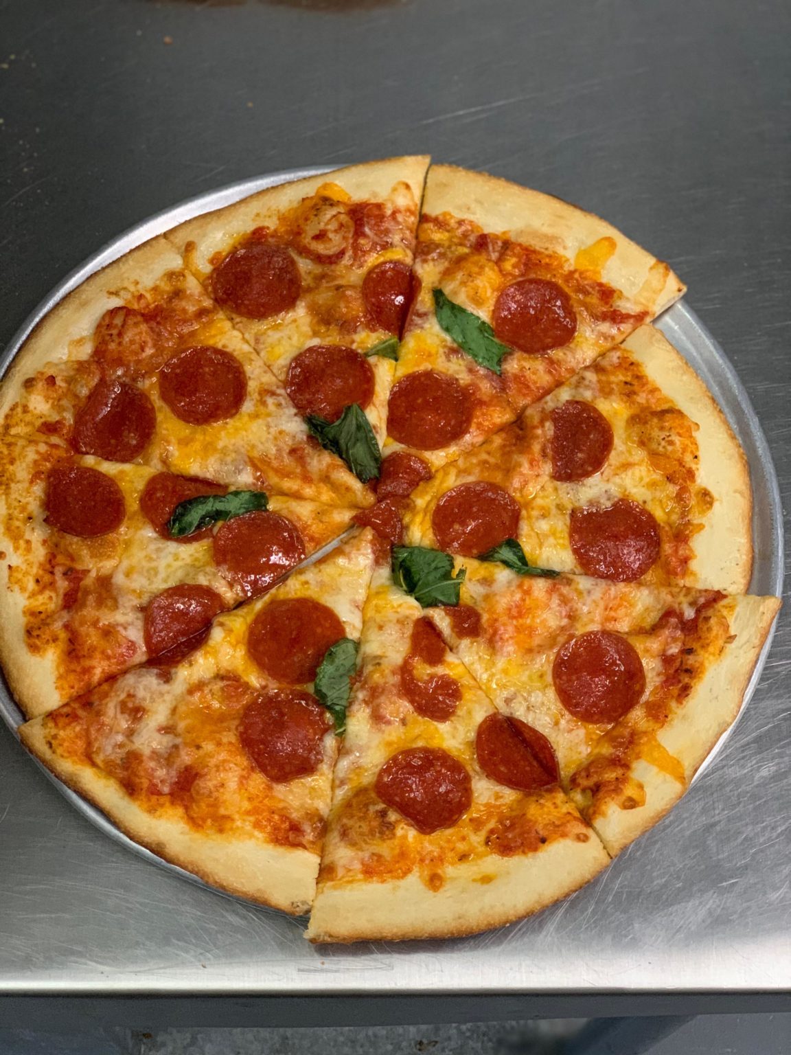 Calzone, garlic knots, and pizza. Why choose just one? Dining and Cooking