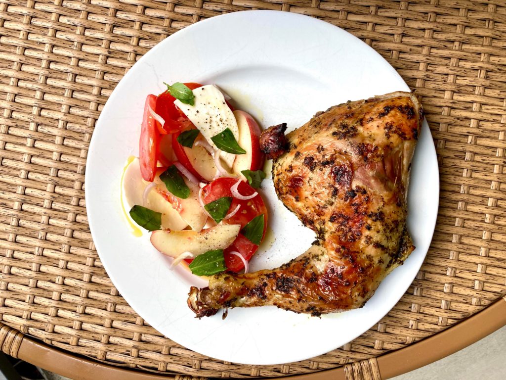 Roast chicken leg with my new favorite summer salad - nectarine, tomato, and mozz