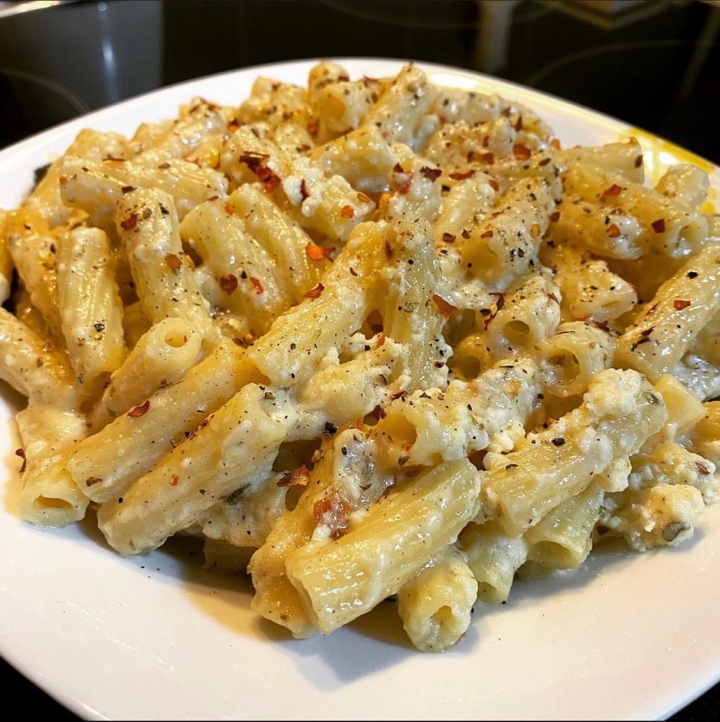 Rigatoni with feta sauce, egg, garlic and red pepper flakes