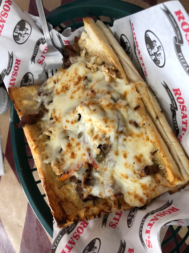 Italian beef on garlic bread with spicy gairdiniera