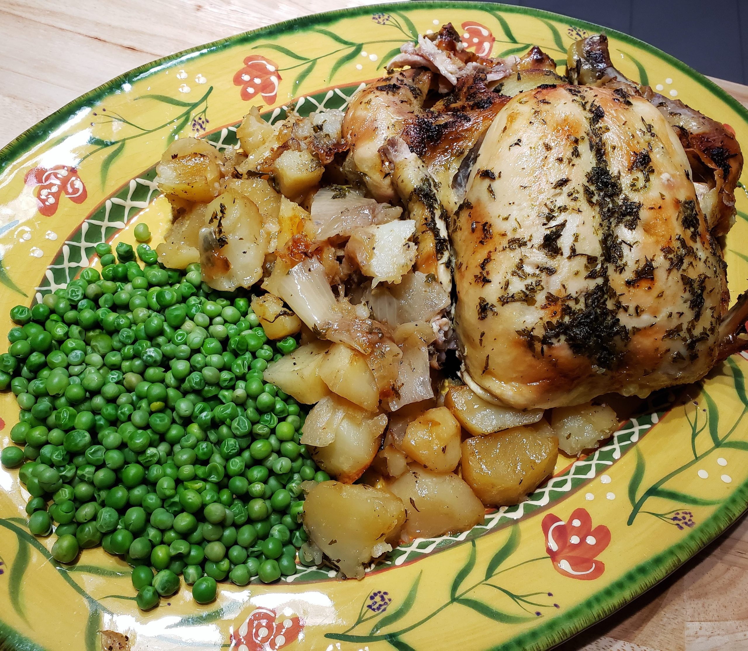 Herb and garlic roasted chicken with potatoes and peas Dining and Cooking