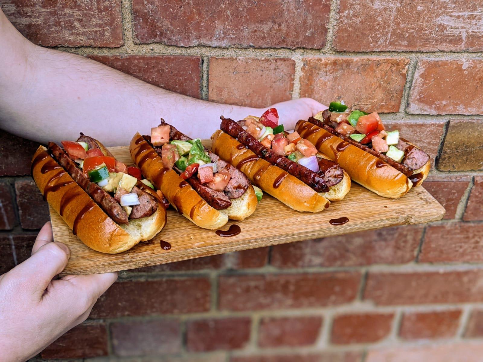 Applewood smoked jalapeño cheddar sausages, made from scratch...buns