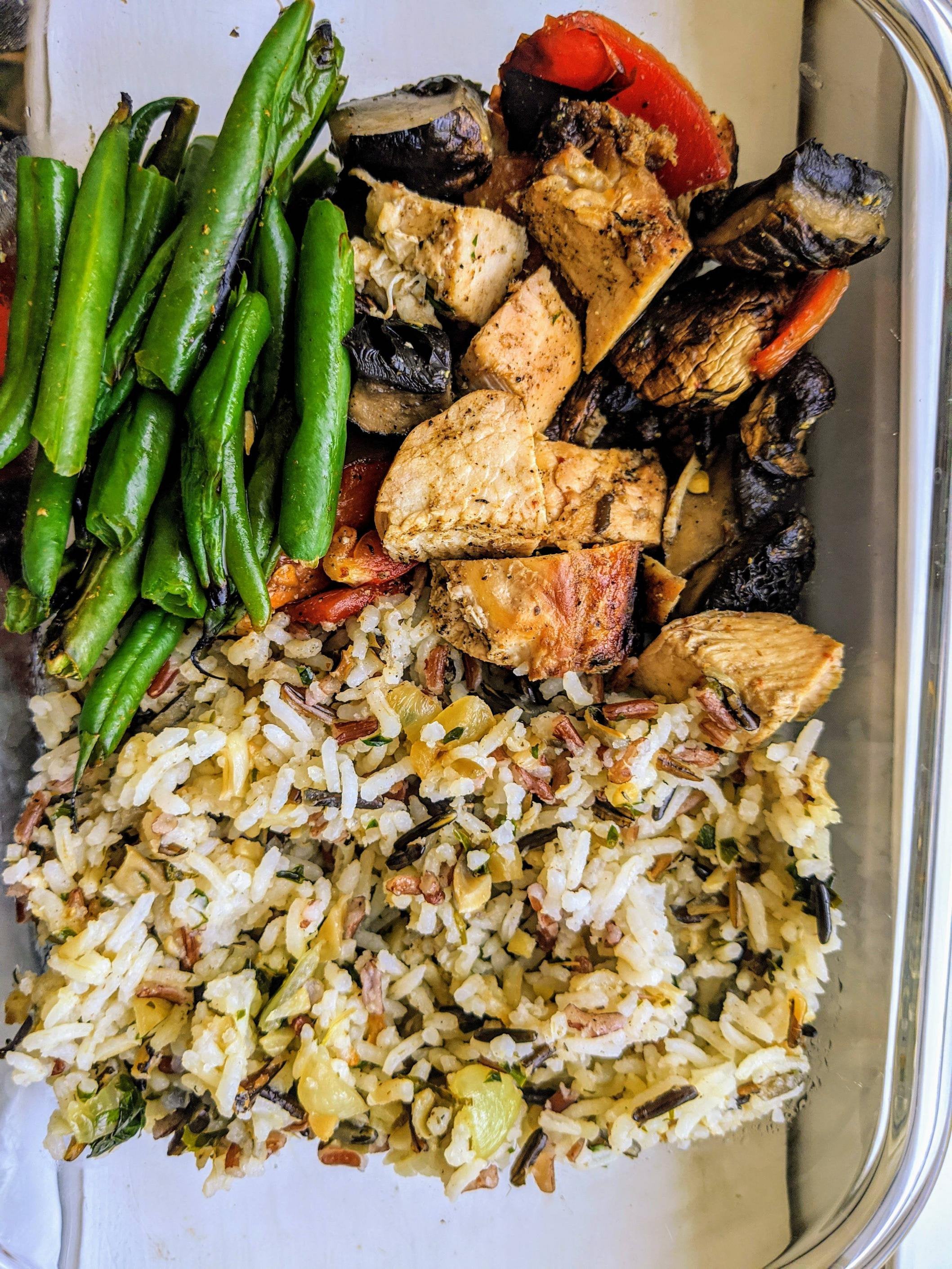 Grilled chicken and veggies with wild rice pilaf mitakis parsley and