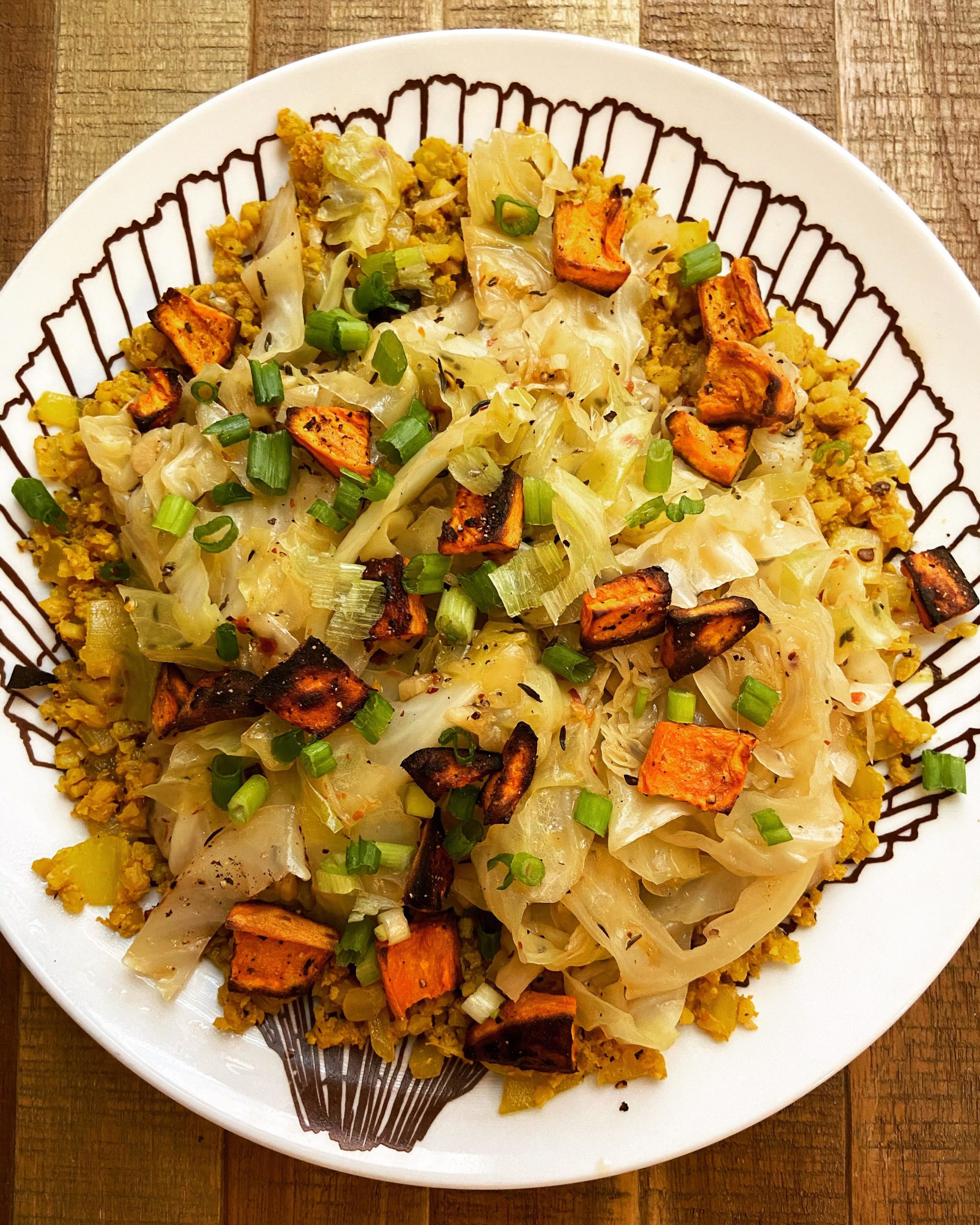 This. Was. Amazing. Braised green cabbage over cauliflower rice and