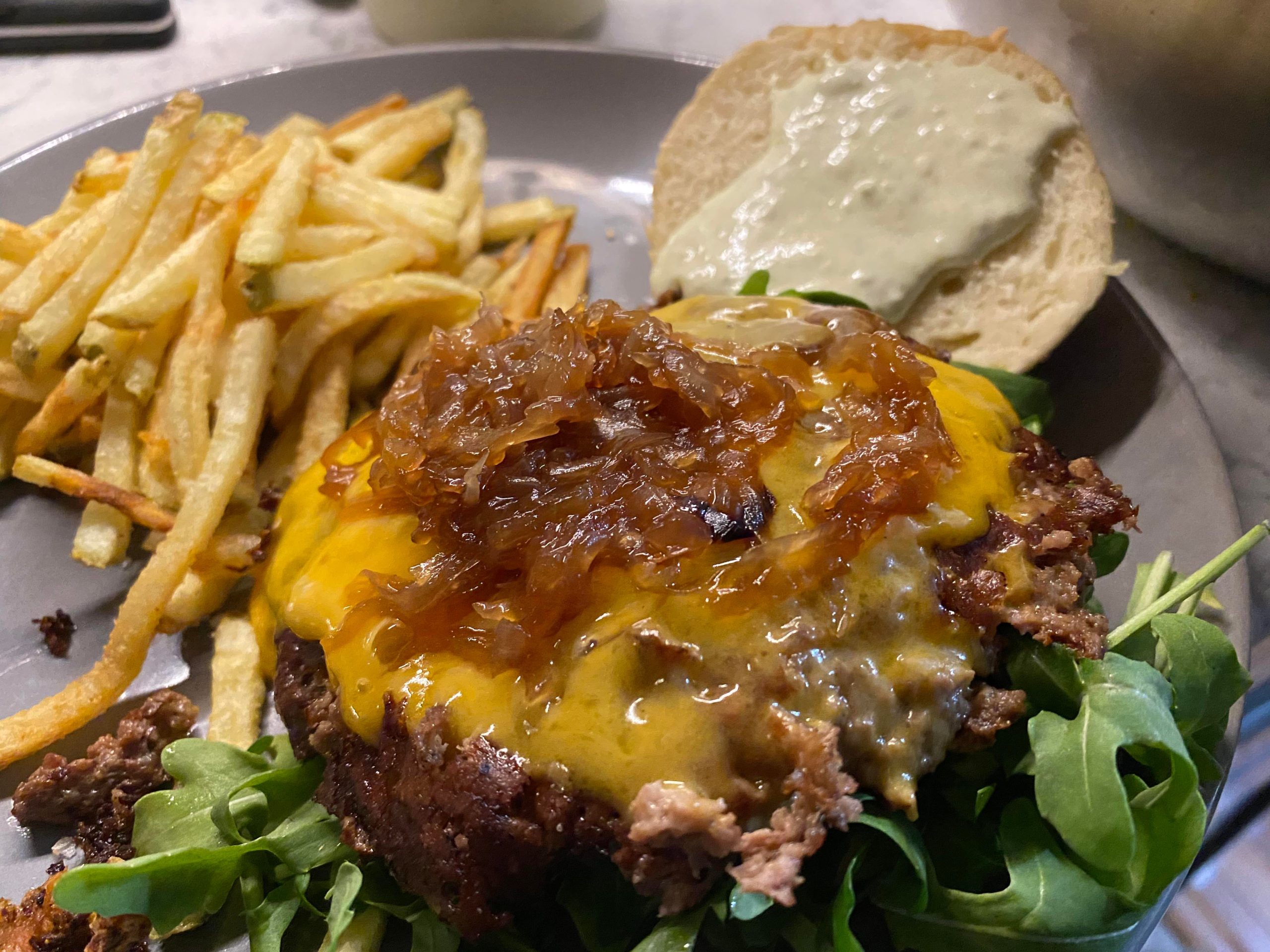 Hand chopped sirloin/chuck, aged cheddar, carmalized onions, roasted