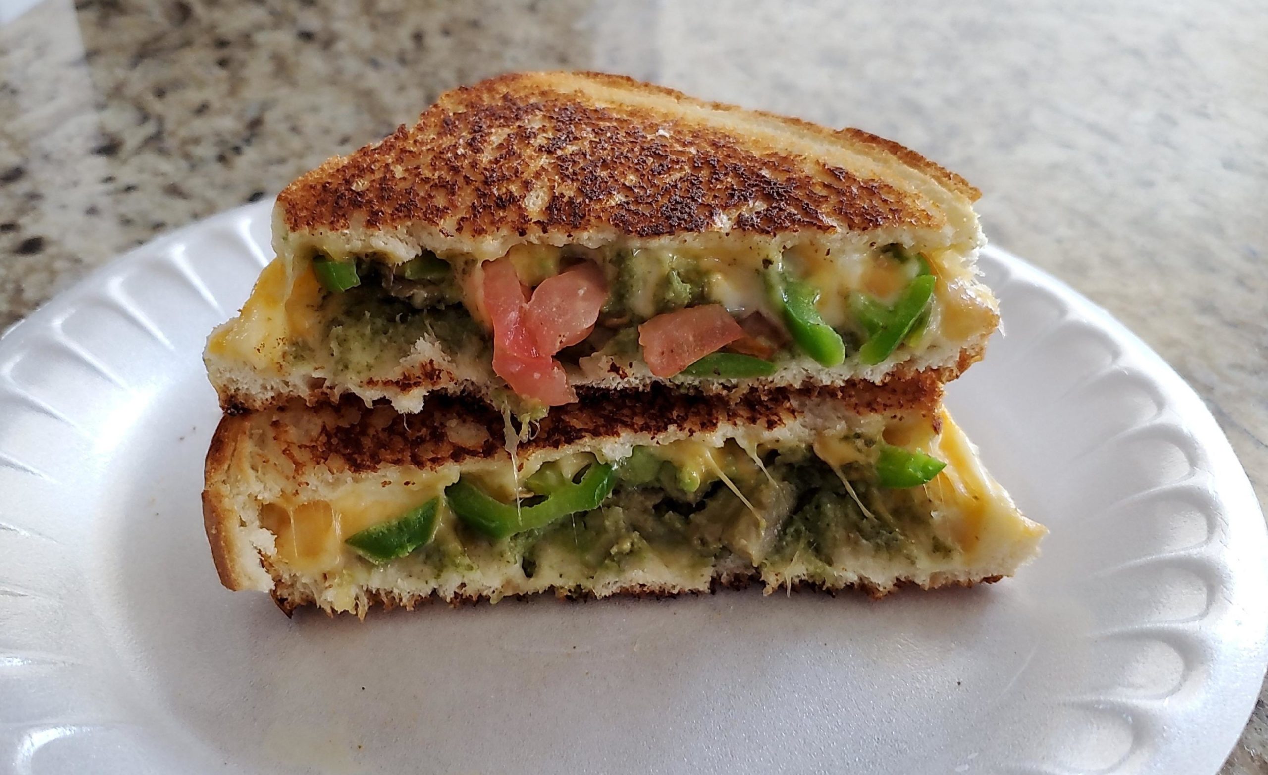 New brisket grilled cheese sandwich with macaroni from Holy Smoke in