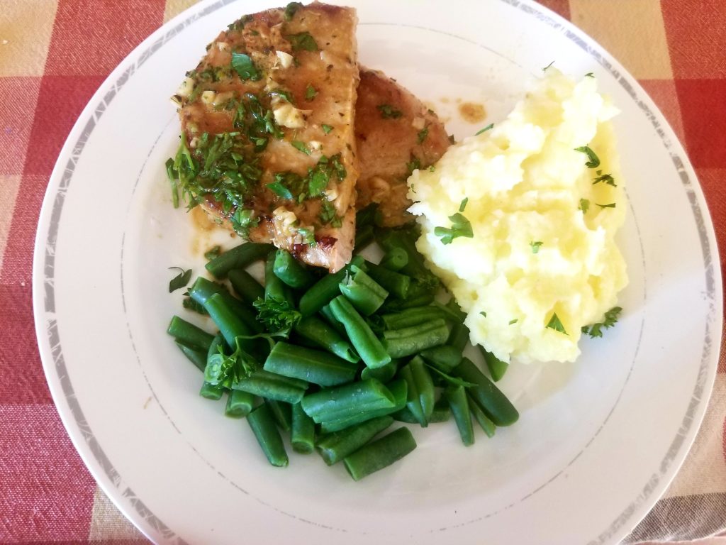 Citrus glazed porkchops, mashed potatoes and green beans