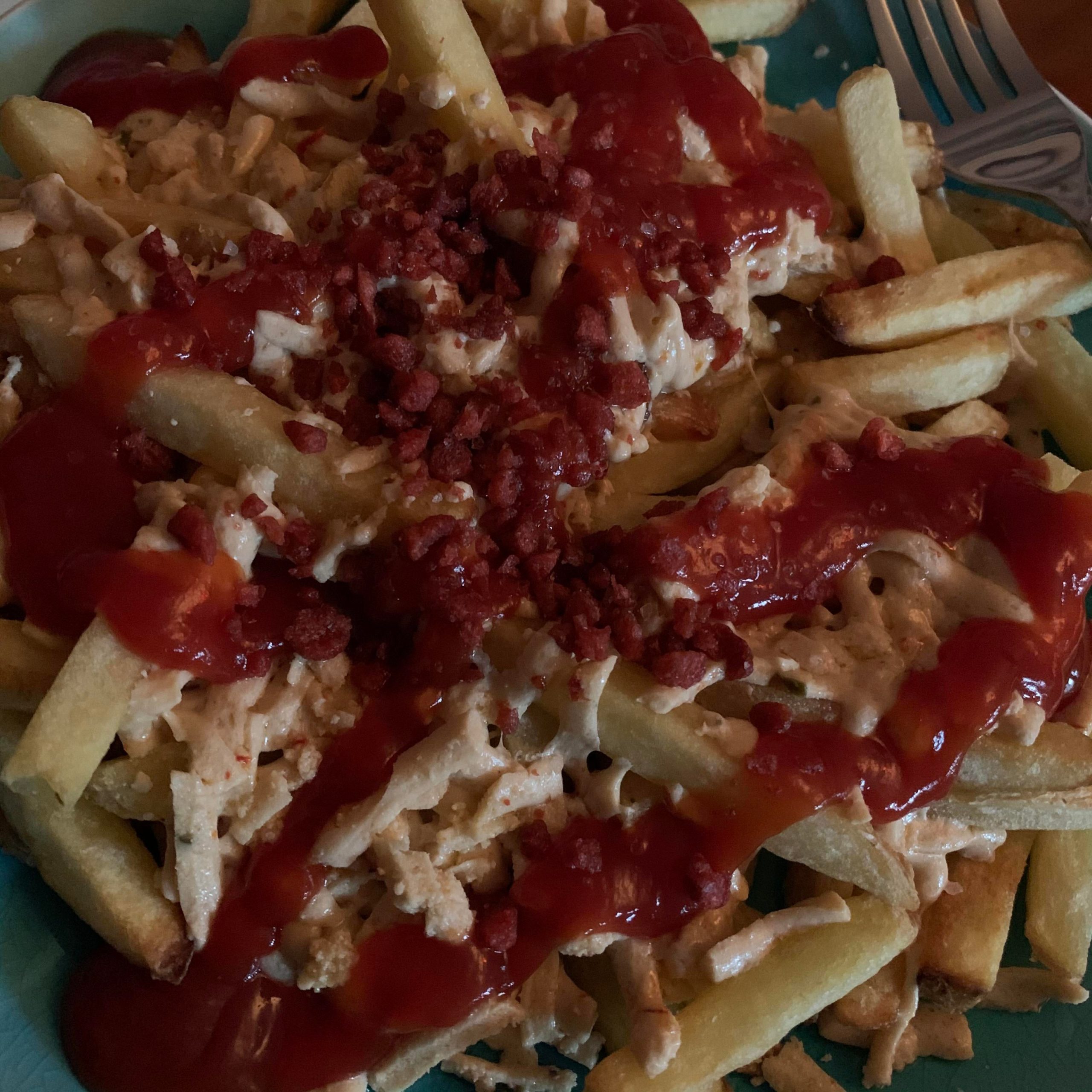 Amazing cheese fries with Daiya pepper jack, vegan bacon bits, salt and
