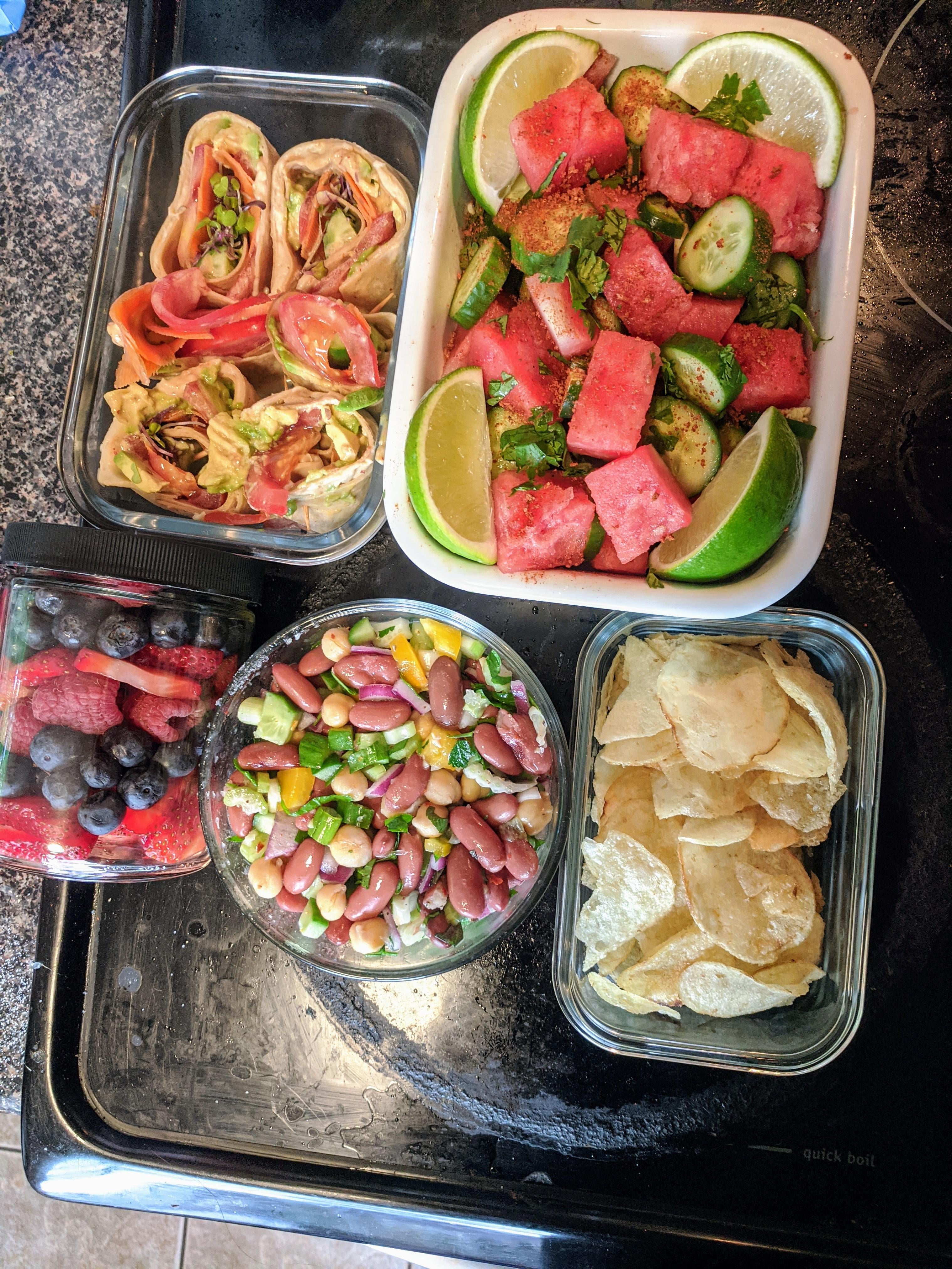 Packing a picnic lunch for two dining and cooking