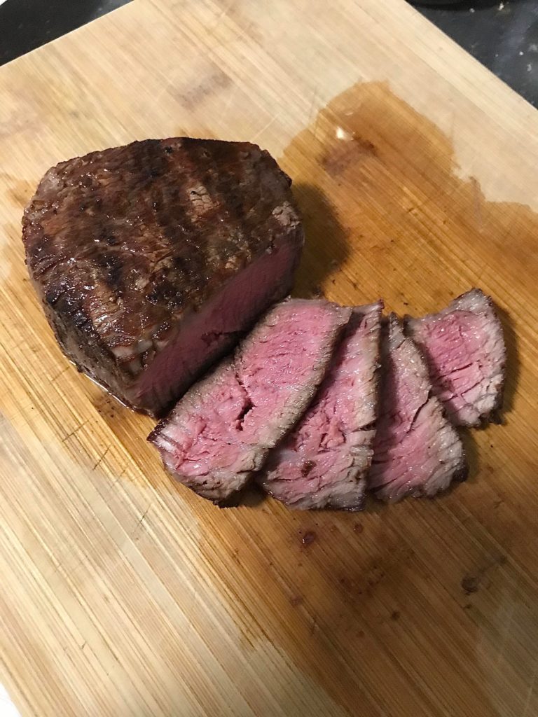 4th bone in prime ribeye, 32oz. Smoked to 130 then seared on a charcoal