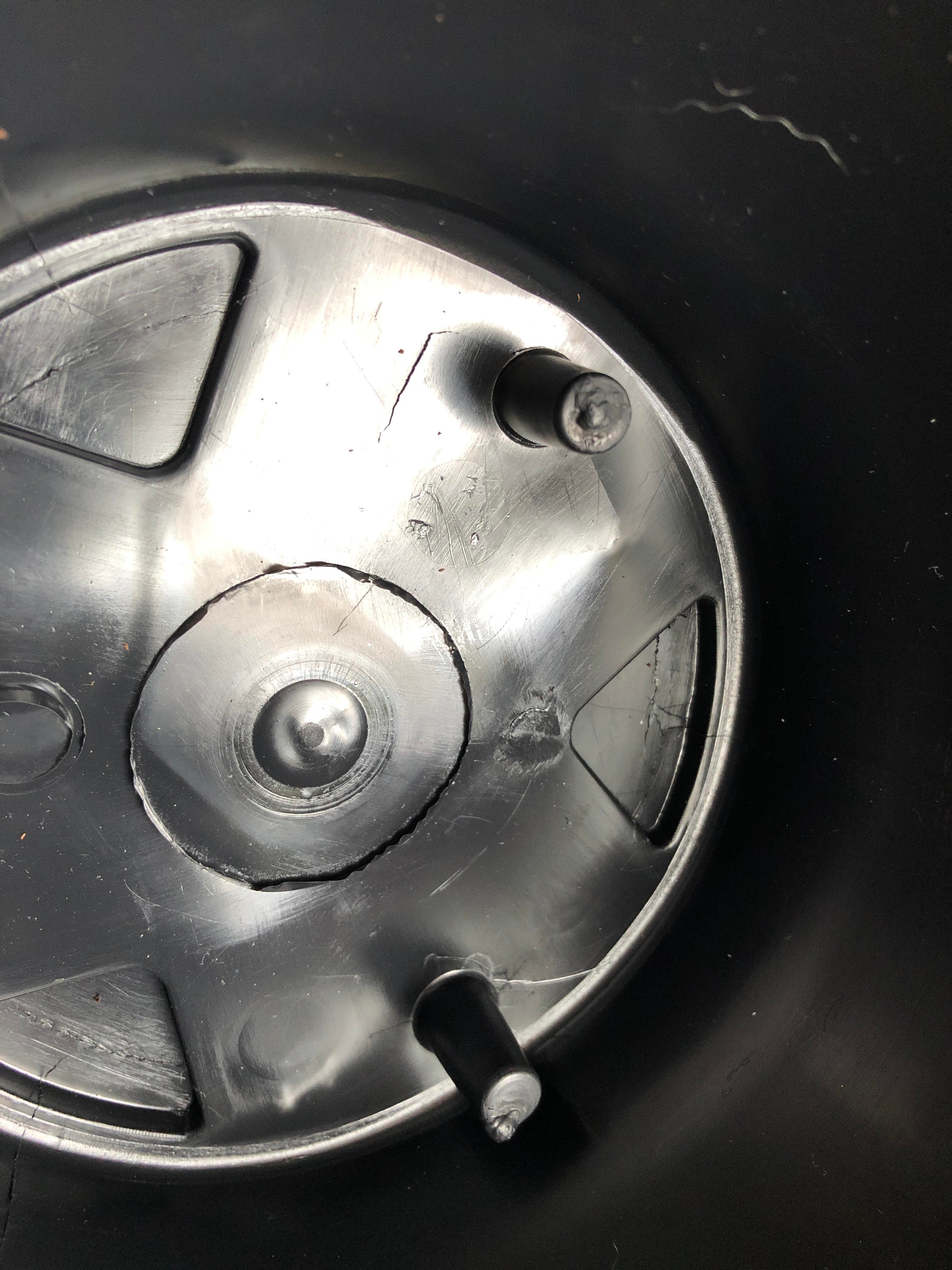 Can anyone tell me how to remove these hollow plugs so the pot has