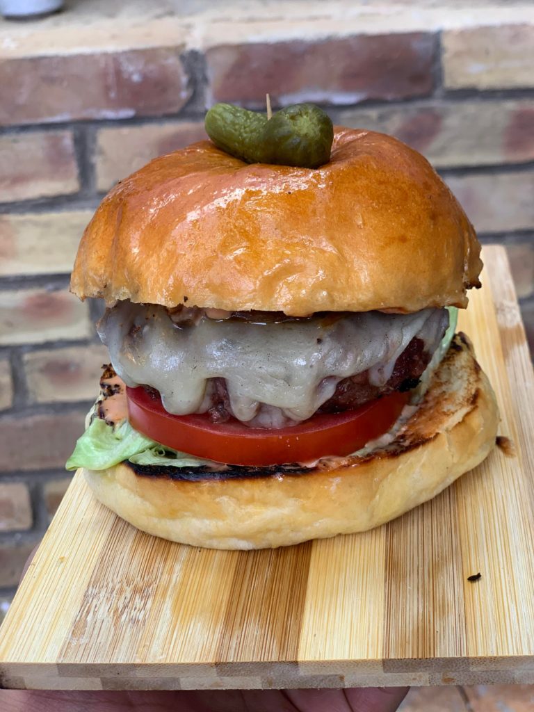 Grilled cheese burger on homemade brioche bun