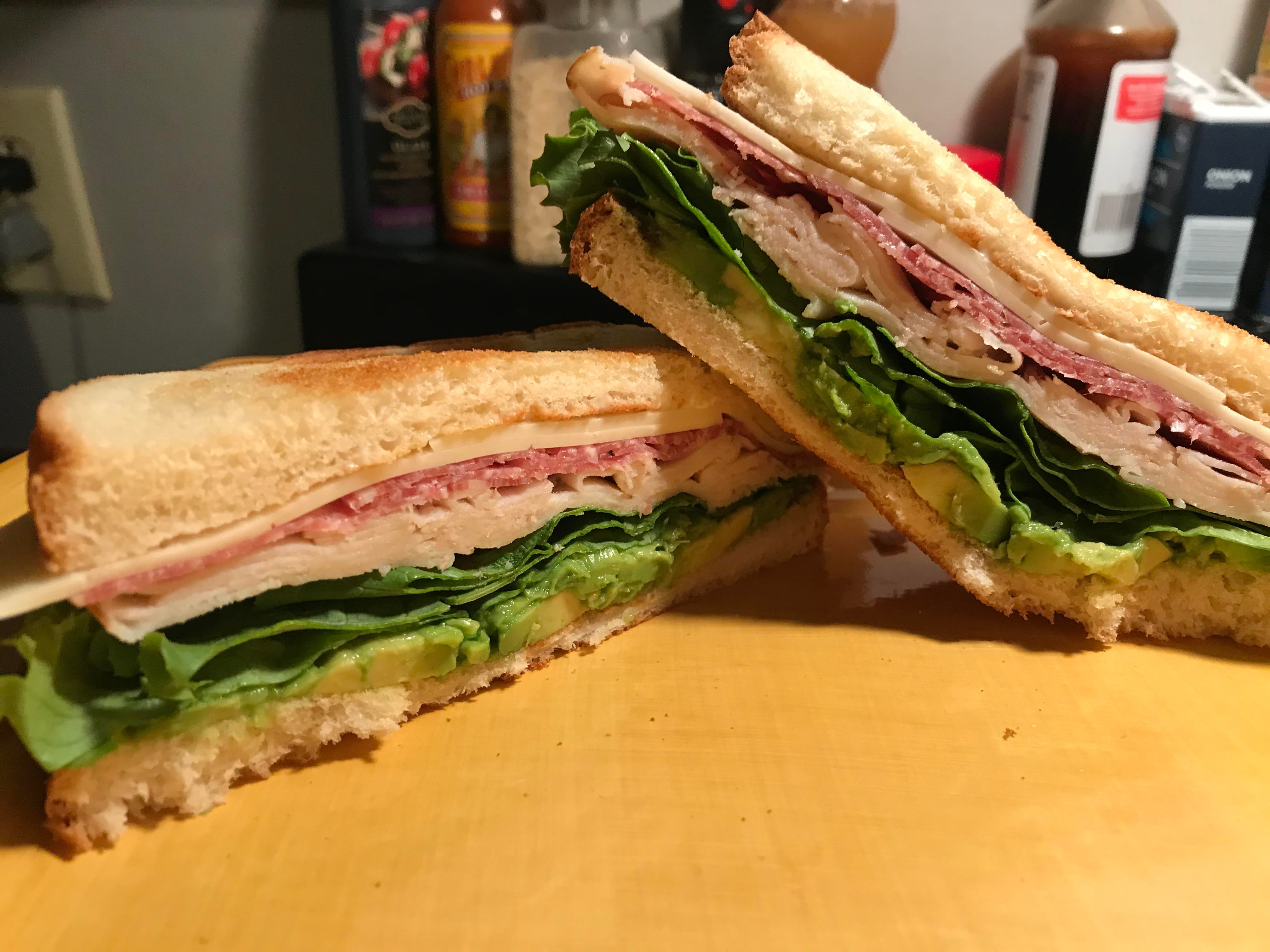 [homemade] turkey, salami, avocado, lettuce, havarti and mayo on