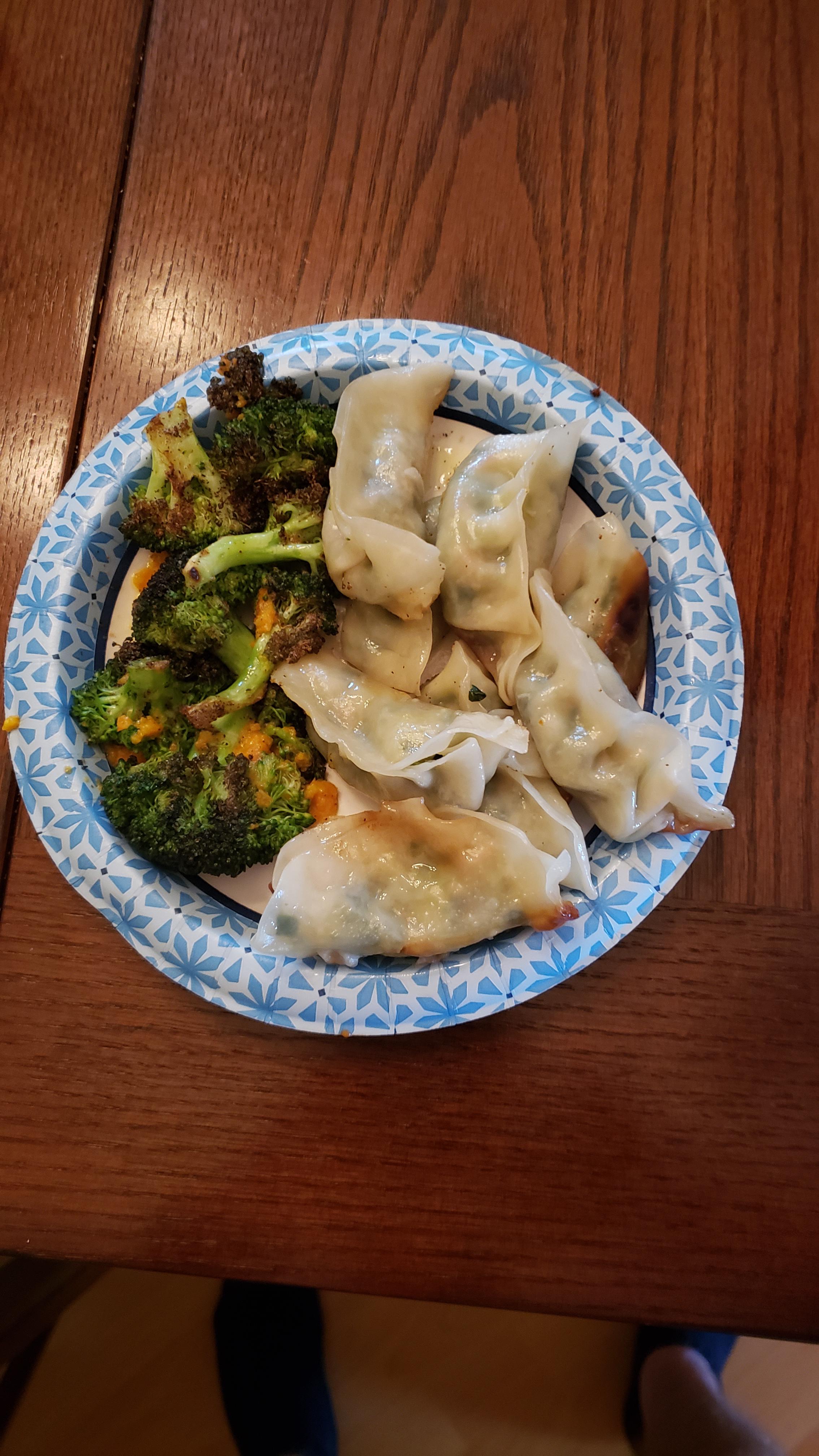 Trader Joe's Vegetarian Potstickers with Broccoli. Topped off with some Miso dressing. Dining