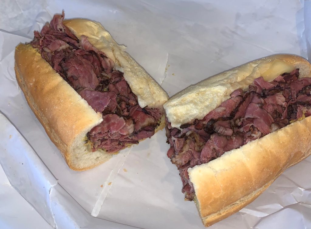 Pastrami sub with Swiss cheese and spicy mustard