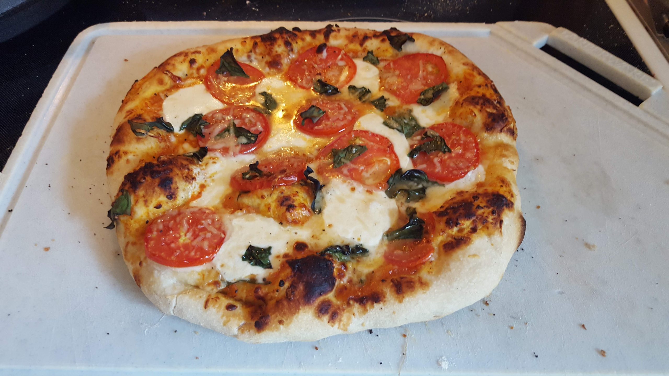 [Homemade] First time using Green Mountain Grill pizza oven Dining