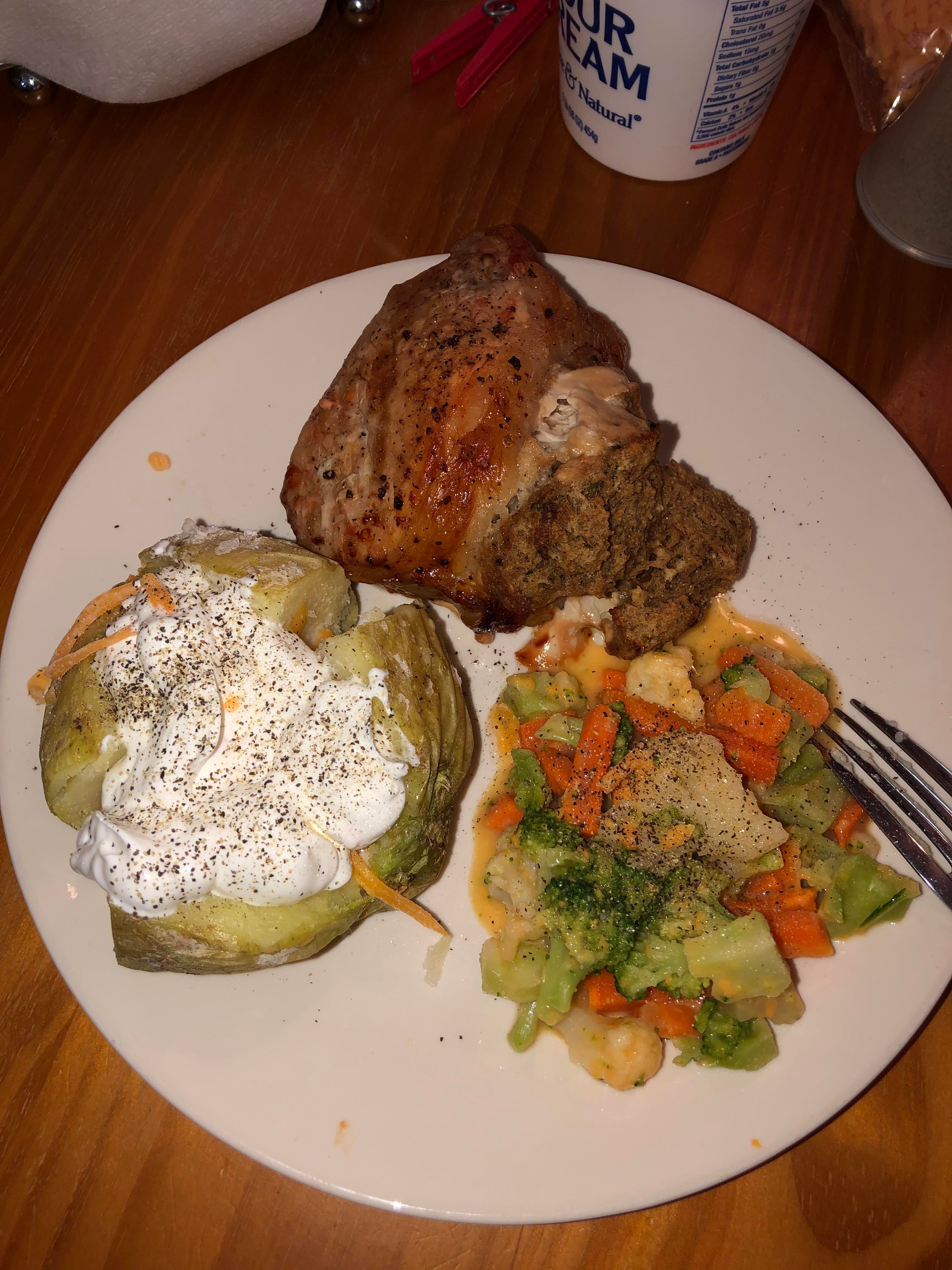 Actually cooked a decent meal tonight. Stuffed pork chops baked potato