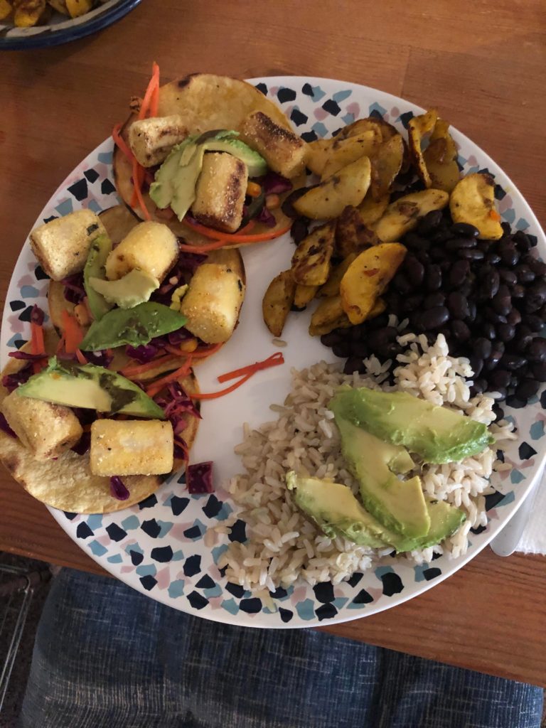 Now THAT’s a taco plate, Hearts of Palm Street Tacos w/ lime jalapeño slaw, fried plantain chips, black beans and rice