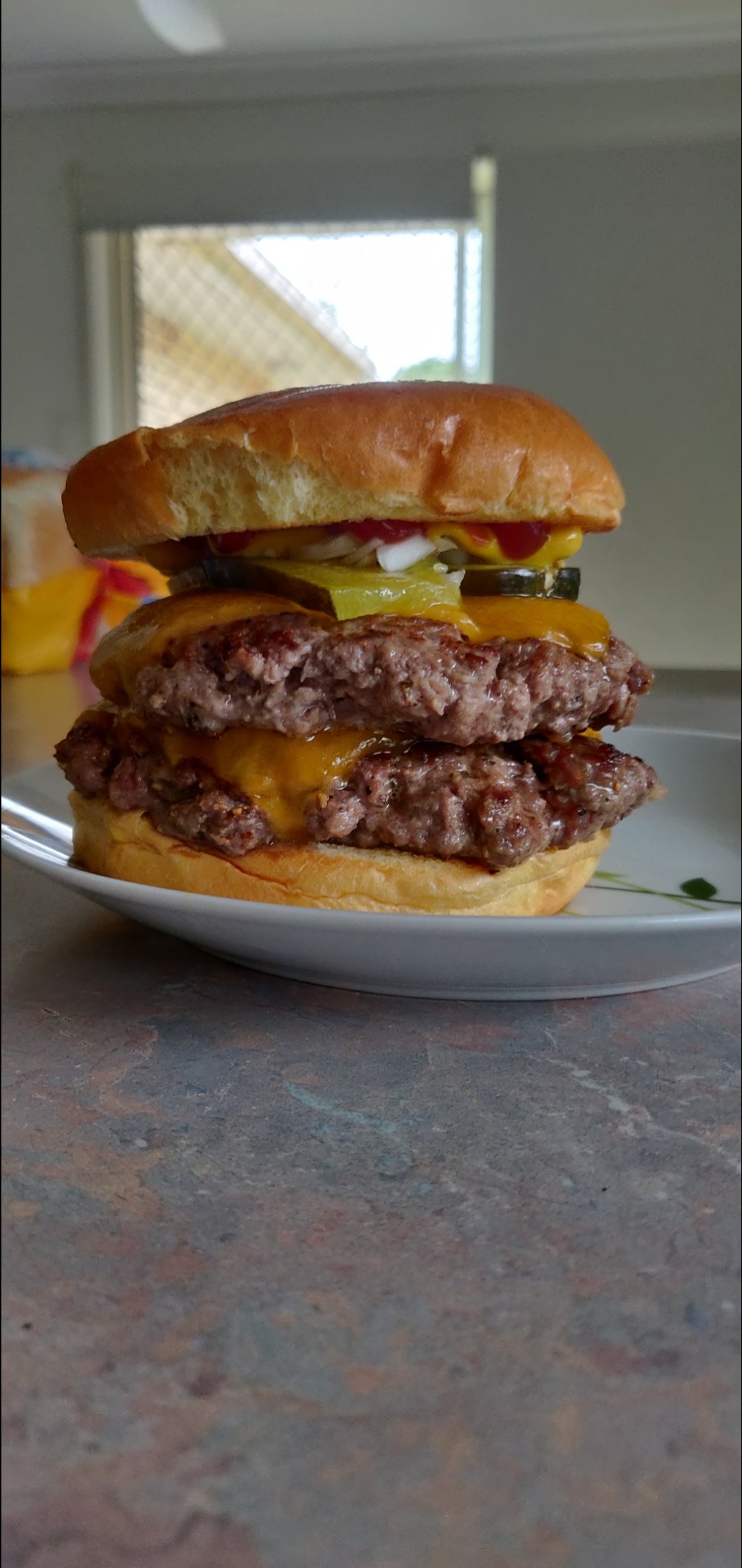 My housemate asked me to make his favourite fast food burger, a double quarter pounder. Dining