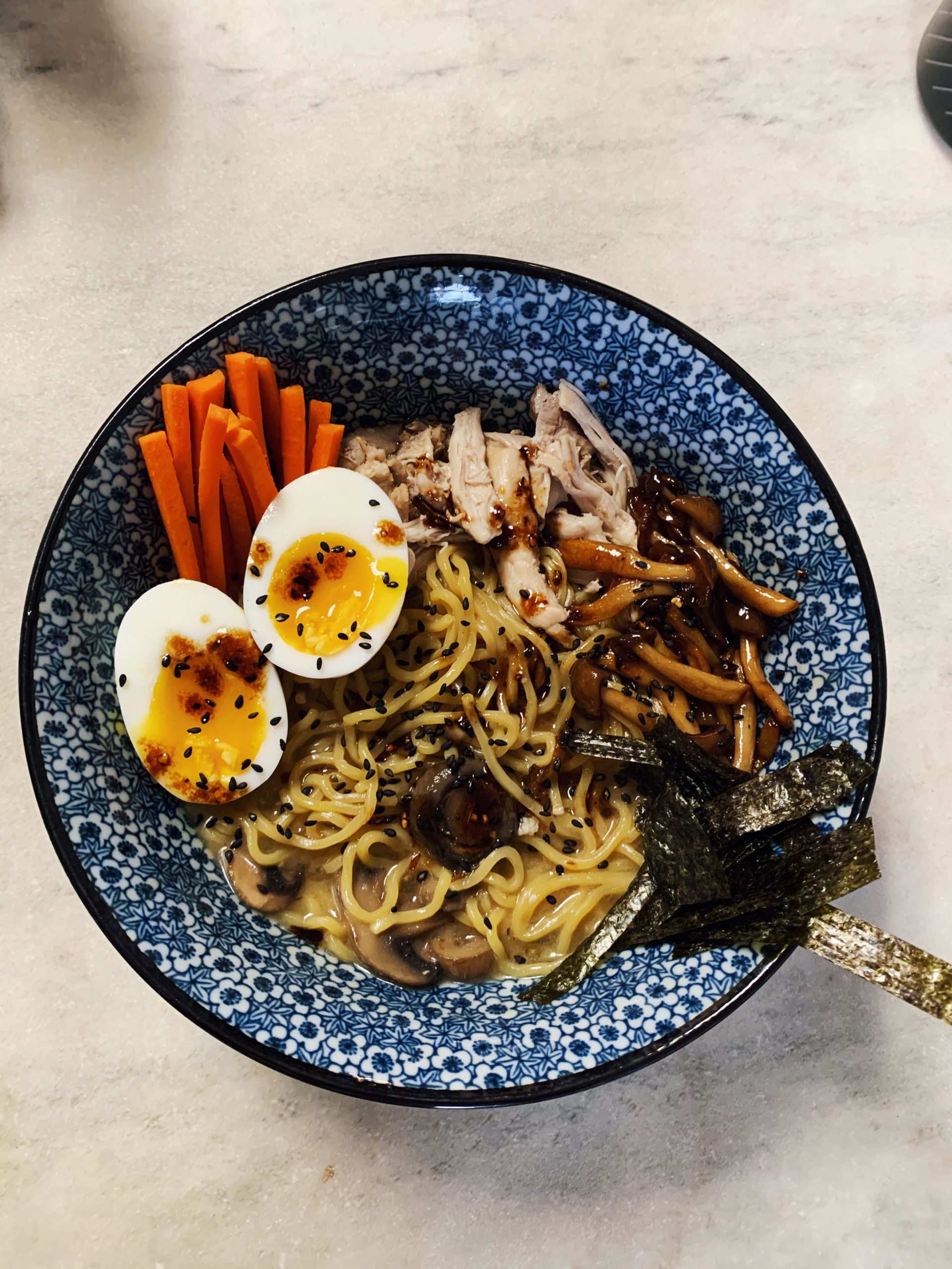 Homemade creamy miso ramen with fresh noodles and honey soy shimeji