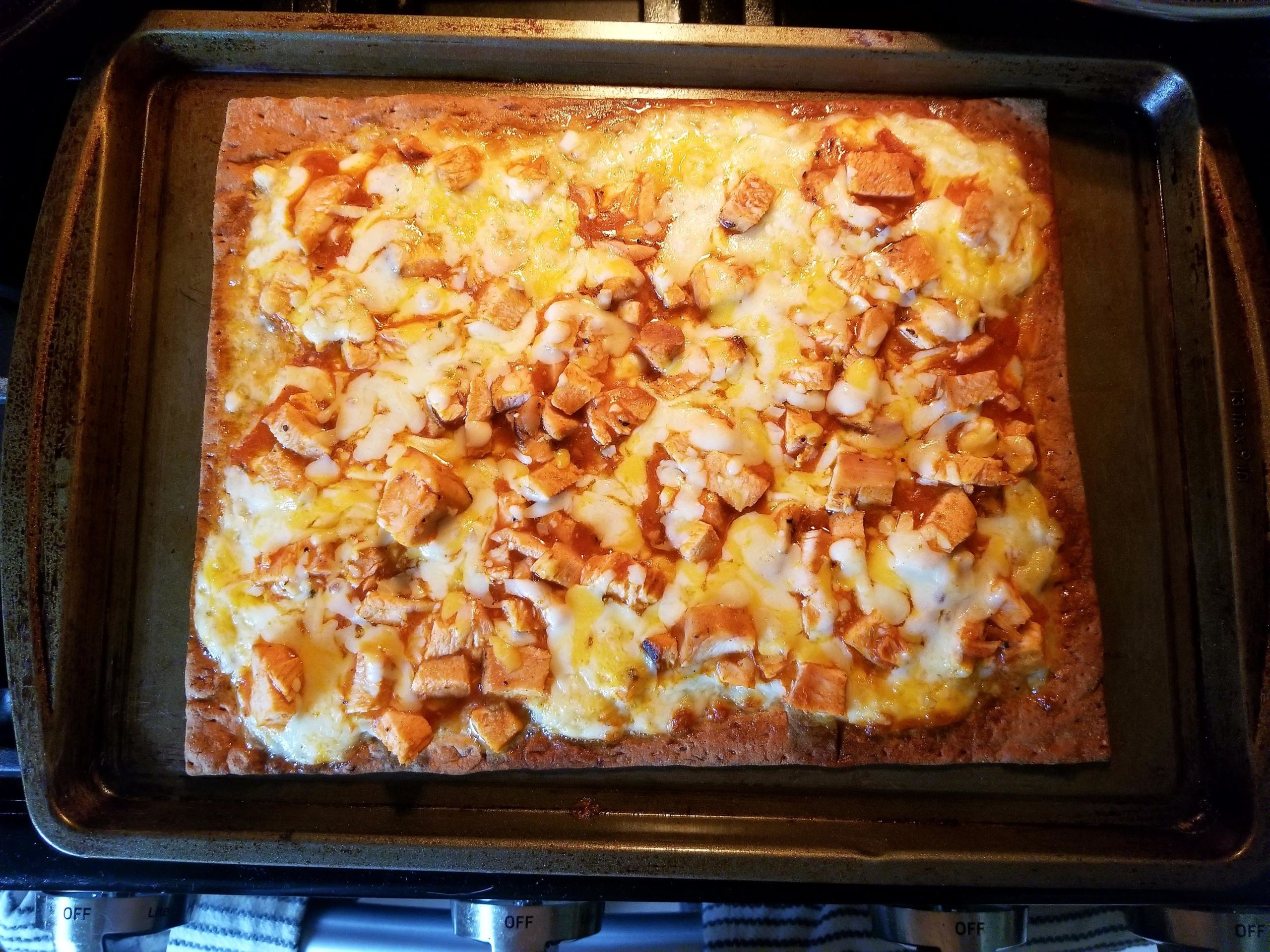 420 calories for half of this large lavash buffalo chicken wing pizza