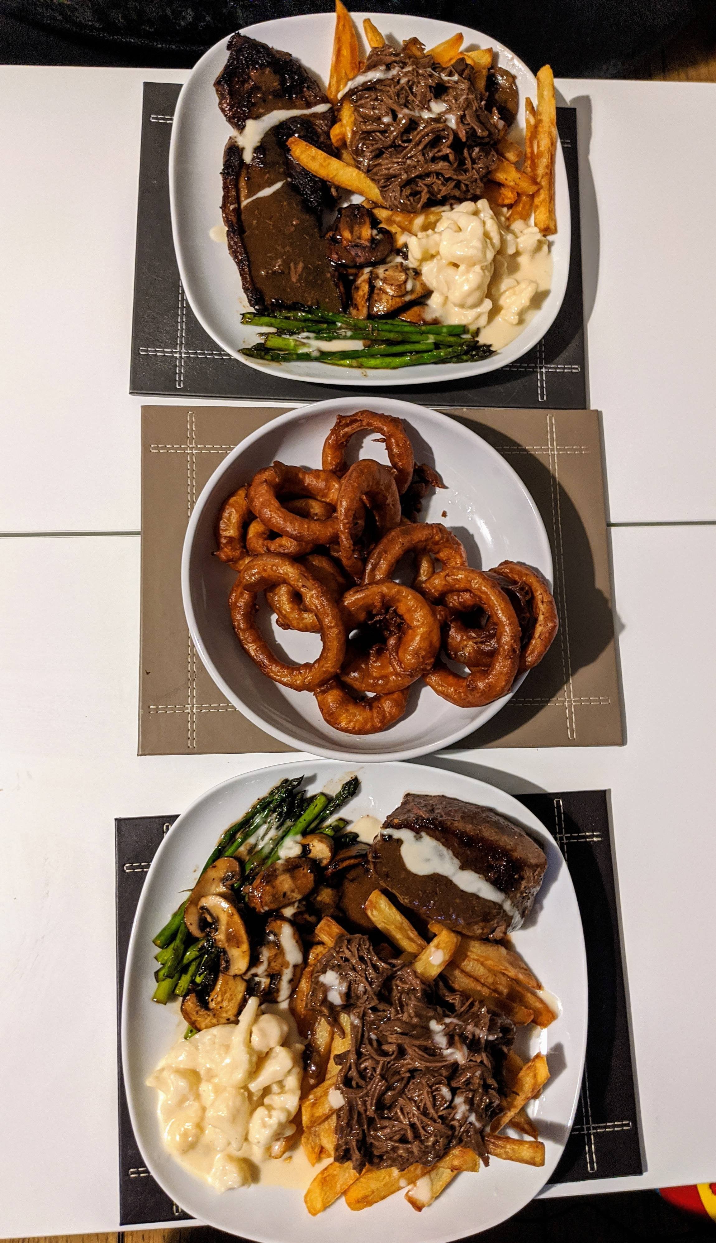 Beef dripping brisket topped chips, asparagus and mushrooms